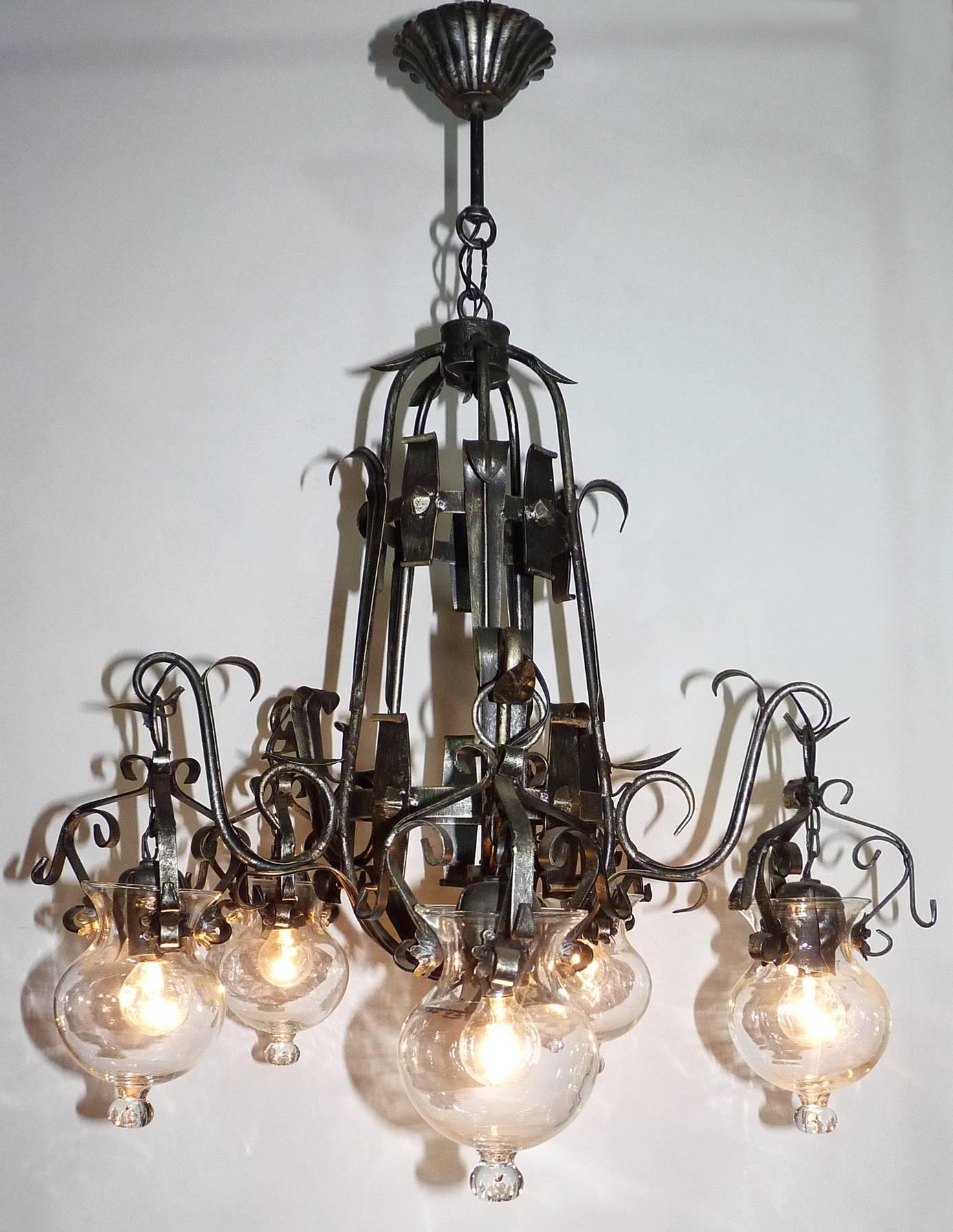 French Forged Iron and Tole Cage-Form Chandelier with Five-Hanging Light Glass Globes For Sale