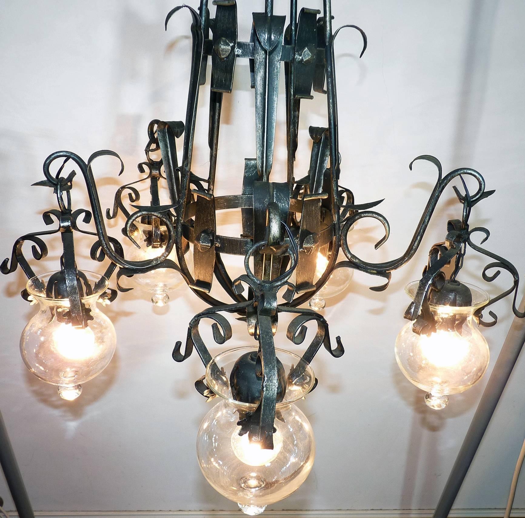 20th Century Forged Iron and Tole Cage-Form Chandelier with Five-Hanging Light Glass Globes For Sale