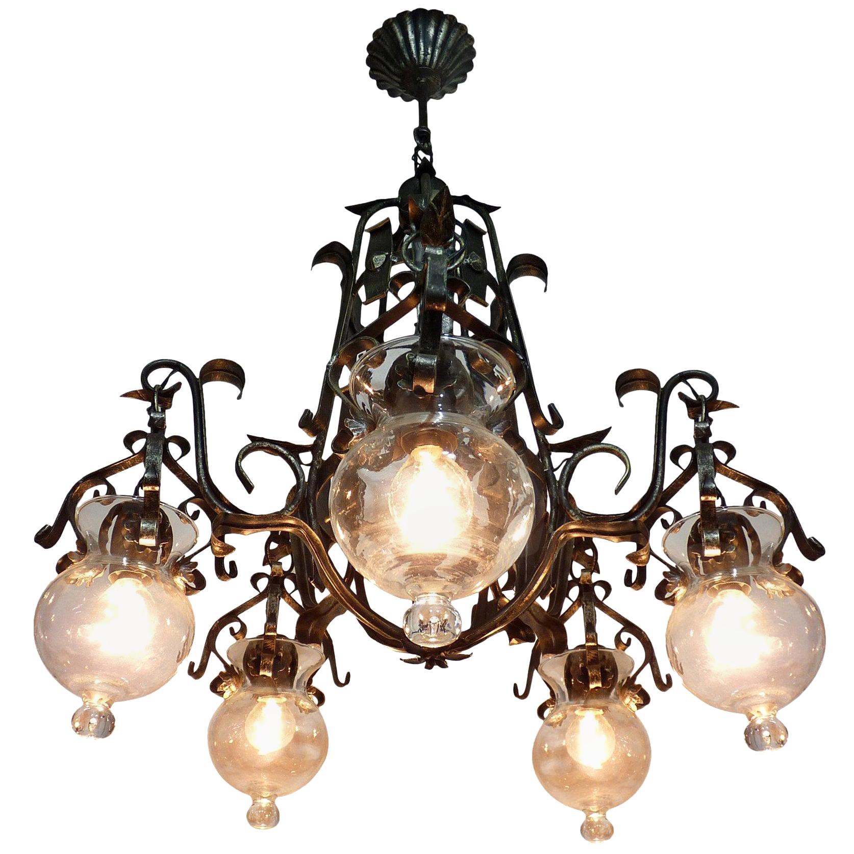 Forged Iron and Tole Cage-Form Chandelier with Five-Hanging Light Glass Globes For Sale