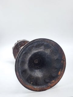 Forged iron candlestick and match holder by Hugo Berger