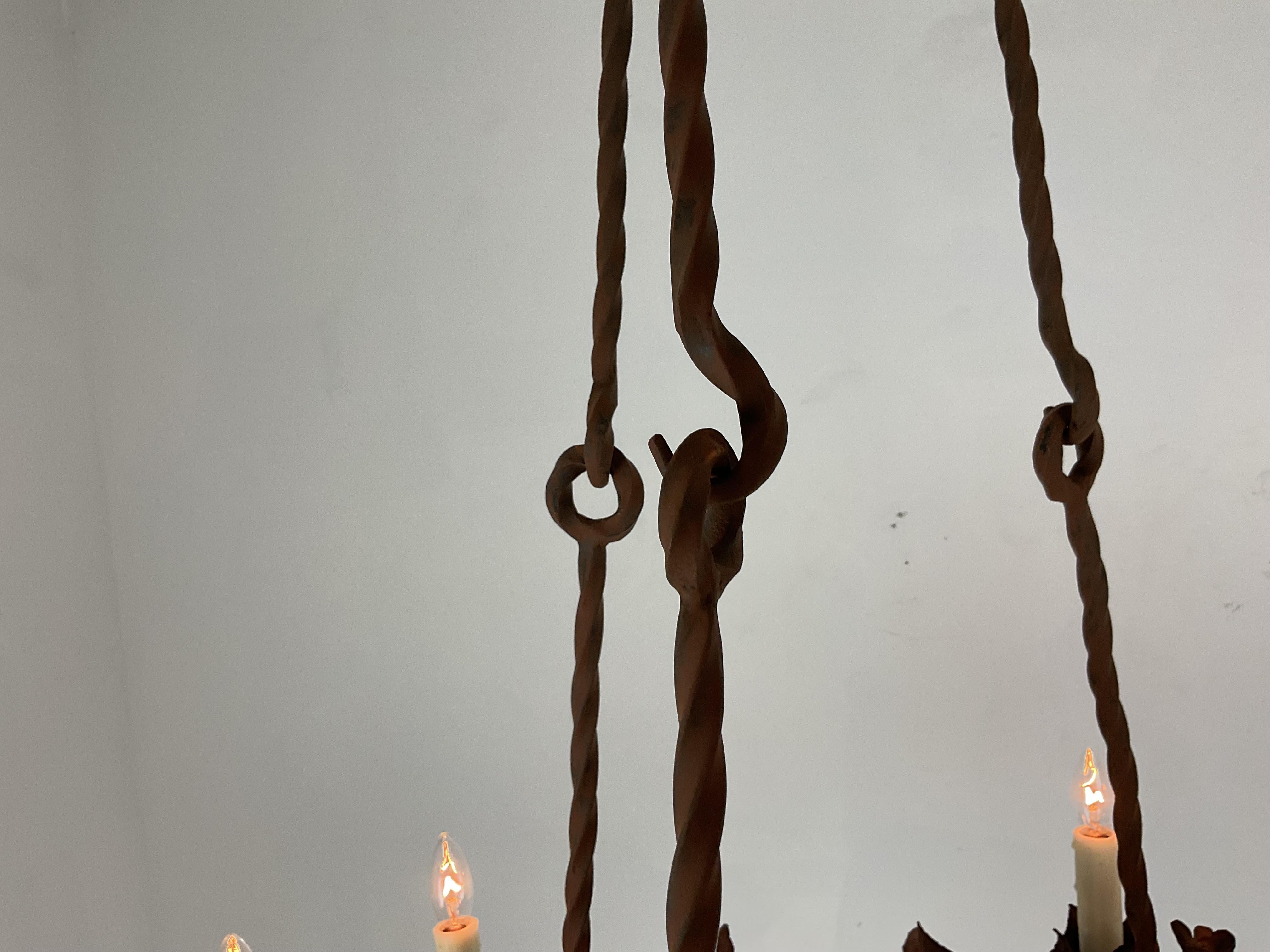 Ferro Lampadario a forma di drago in ferro forgiato in vendita