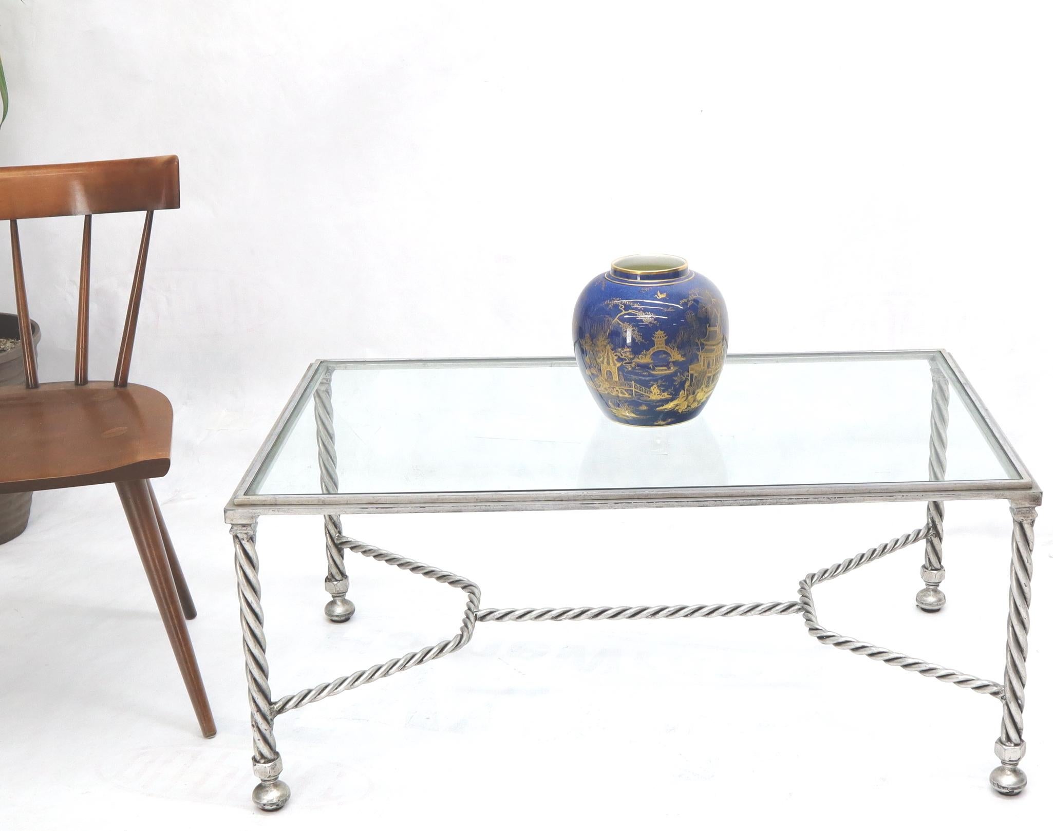 Decorative gilt silver twisted rope style metal base coffee table on ball shape legs.