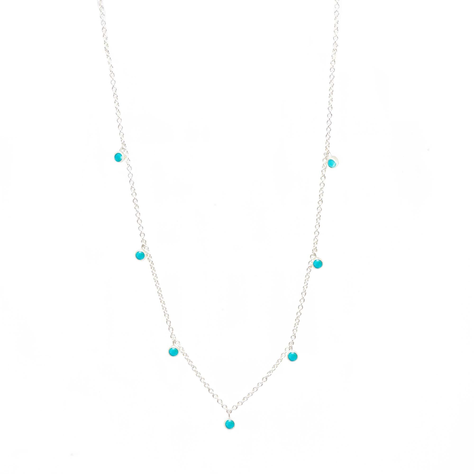 Made with turquoise gemstone rimmed in sterling silver, our Forged Silver Necklace provides an effortless, yet fashionable style. 

Metal: Sterling Silver
Stone carat: 0.75
Length: 15-17''

Stone size: 2.5mm

About the stones:
Genuine Turquoise: