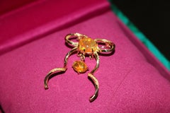 Forget Me Knot Bow Brooch Pendant with Fire Opal and Yellow Diamonds