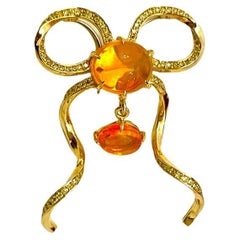 Forget Me Knot Bow Brooch Pendant with Fire Opal and Yellow Diamonds