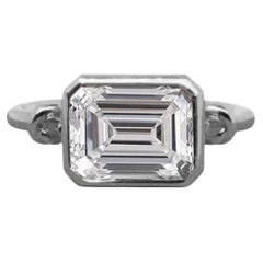Bague Forget Me Knot en or 18ct, diamant taille émeraude