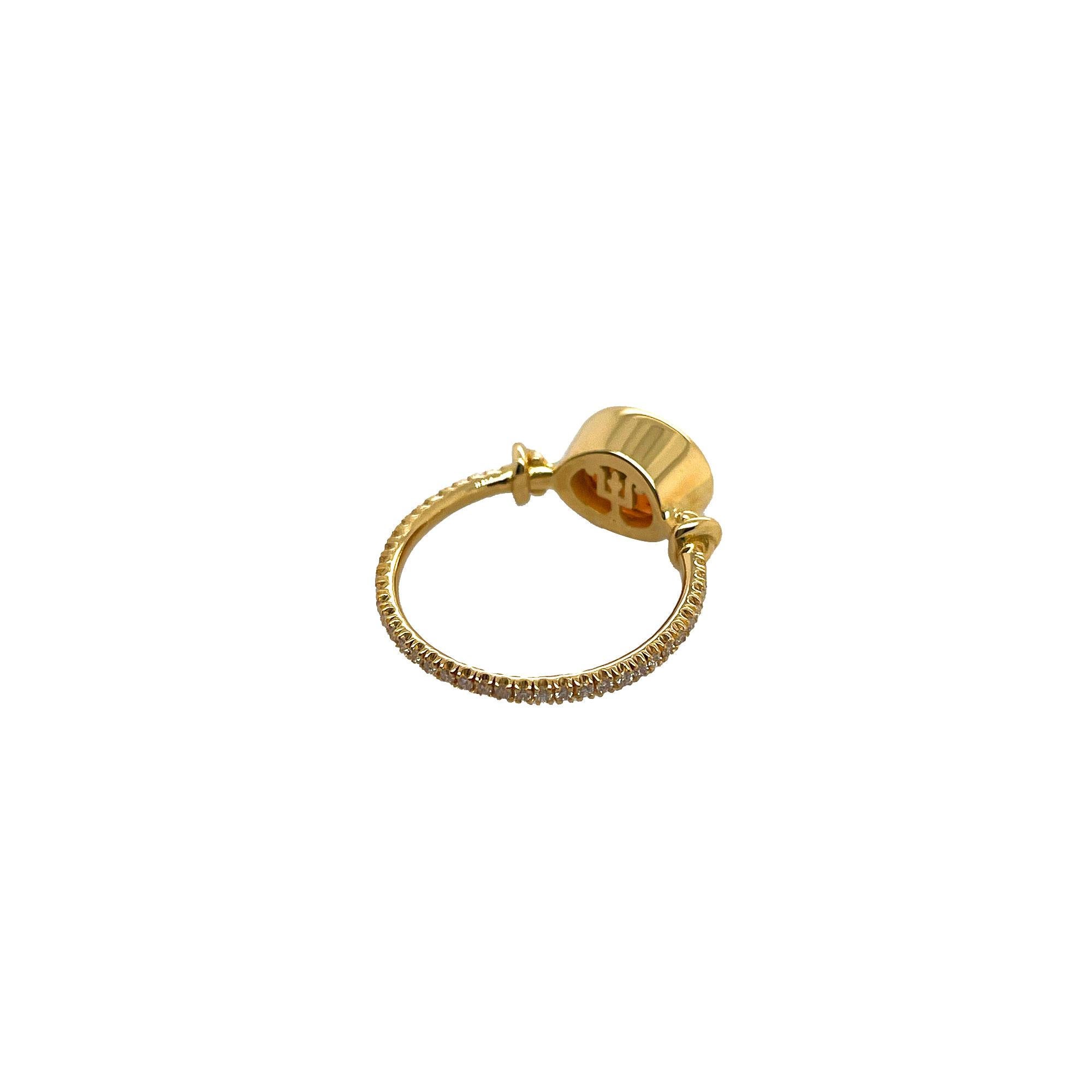 For Sale:  Forget Me Knot Mandarin Garnet Ring in 18ct Yellow Gold 4