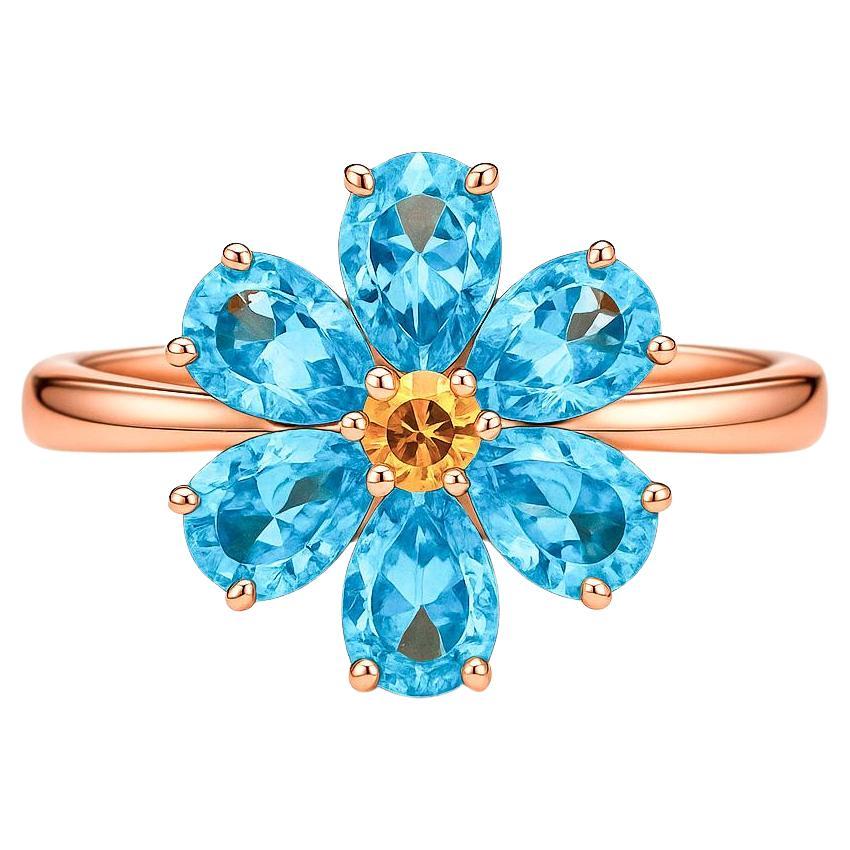 Anello con fiore "Non ti scordar di me" con topazi e zaffiro