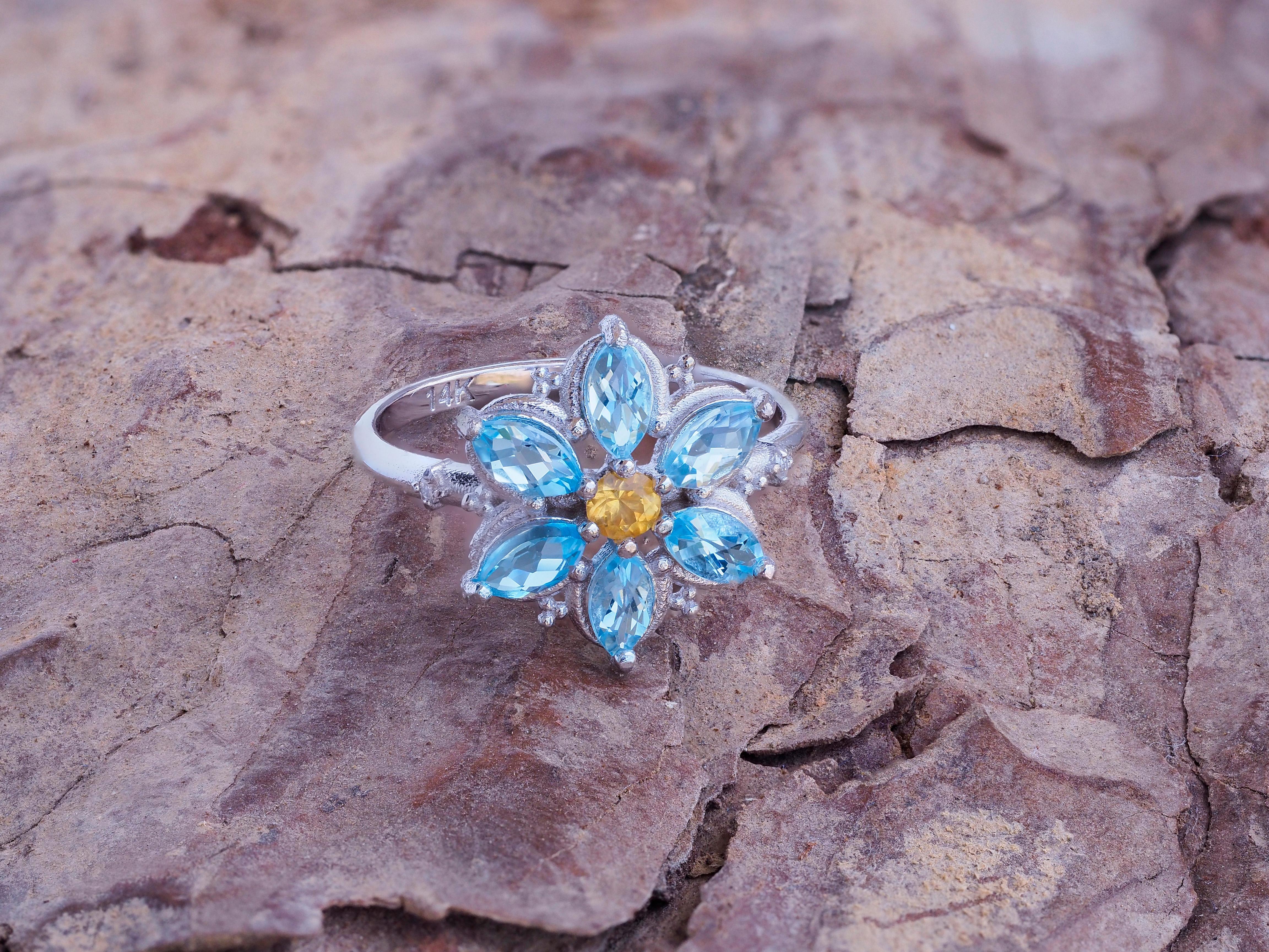 Modern Forget Me Not gold ring with topaz.  For Sale
