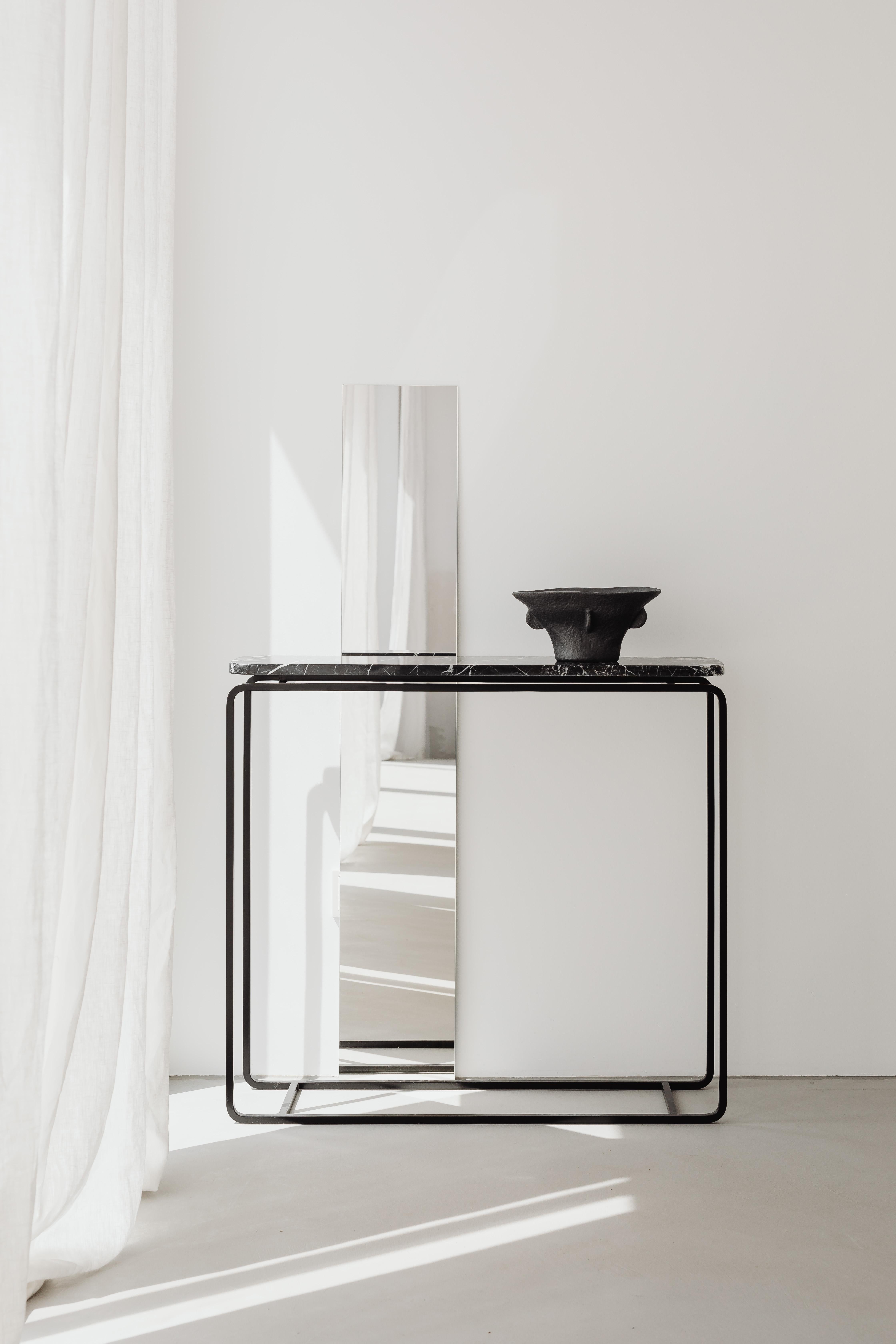 FORM-C is the only console in the FORM collection. The top is slightly raised, and the rounded corners perfectly correspond to the rounded shape of the frame. All of these details combined are the reason this unique console has such a delicate and