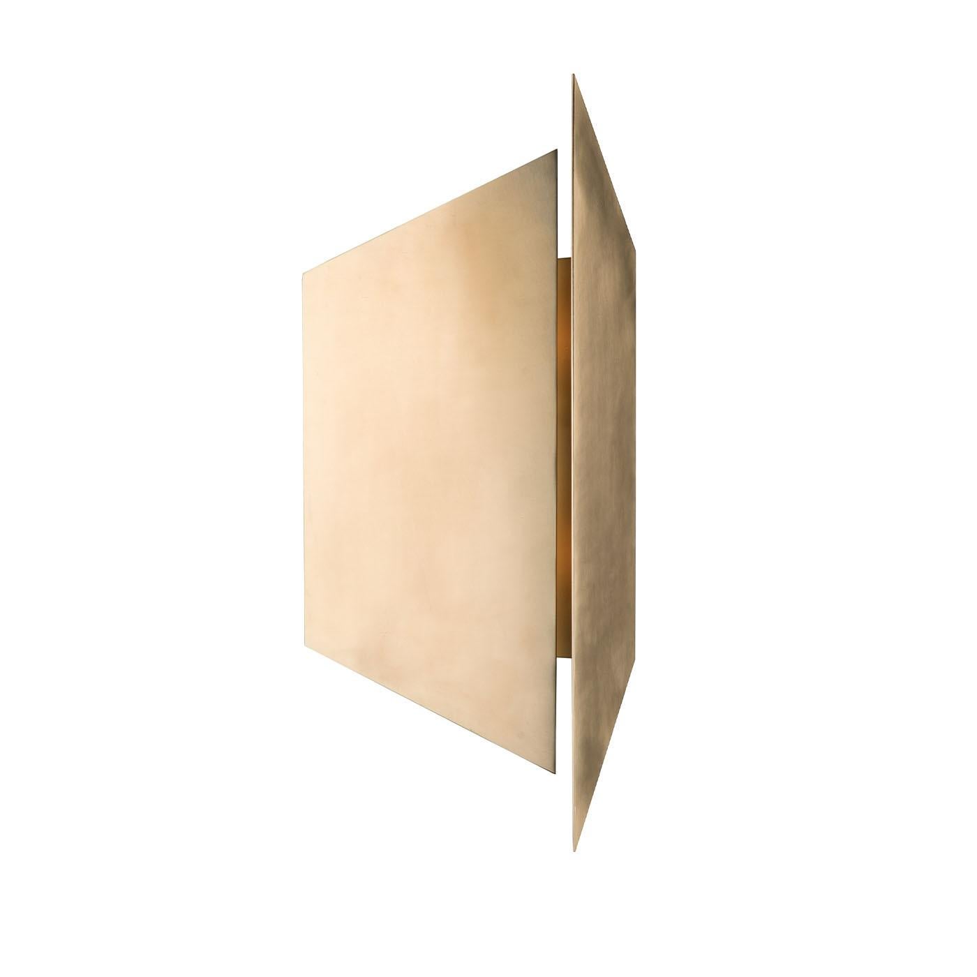 Epitomizing geometric elegance, this wall lamp makes for a splendid addition to refined interiors of contemporary inspiration. The glow radiating from two bulbs - not included - is shaded by a couple of converging bronze plates for a refined