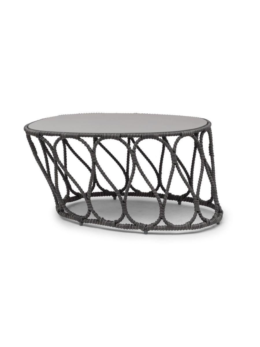 Forma coffee table by Kenneth Cobonpue
Materials: fiberglass, polyethelene, steel. 
Also available in colors: gray and white.
Dimensions: 68.5 cm x 85.5 cm x H 40.5cm 

A contemporary collection perfect for both indoor and outdoor spaces, the