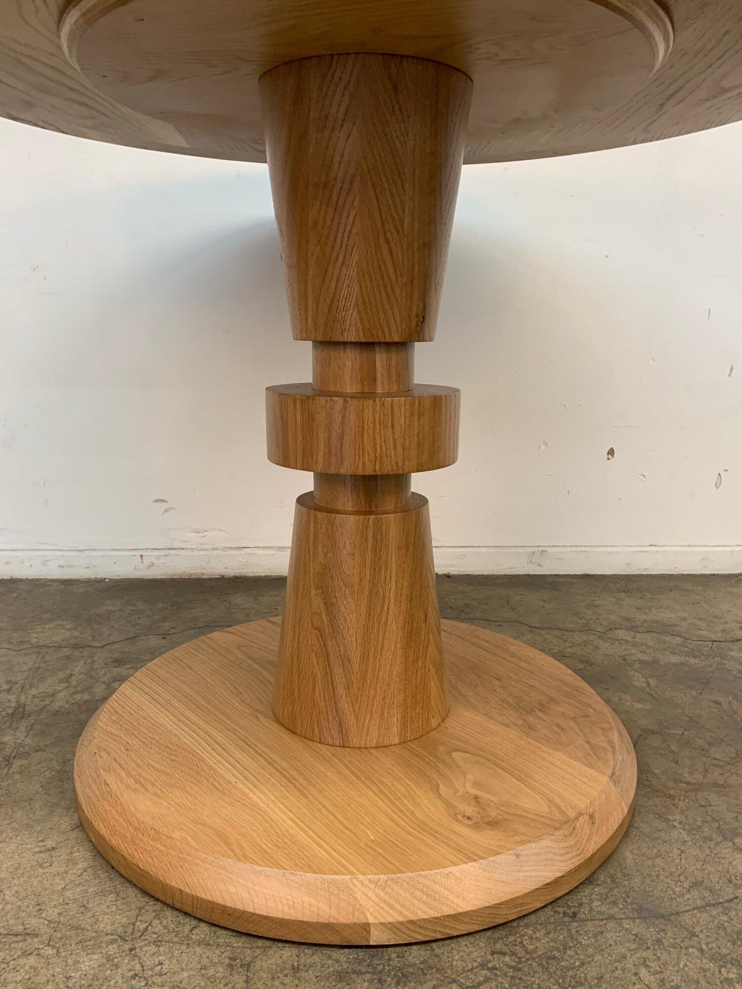 KC29.75
Forma dining table custom made here in Los Angeles. This table includes a clear natural finish, allowing for its organic form to be displayed as is, please note a clear coat does show natural imperfections in the wood. Finish can be