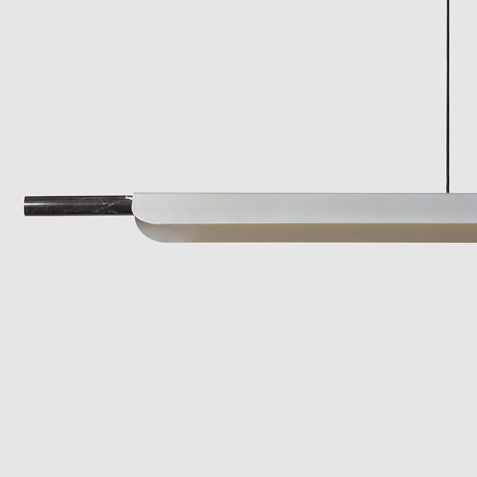 Formation Linear pendant is a sleek, luxurious aluminum and marble fixture ideally suited to hang above Kitchen islands, dining tables, works spaces and other environments that require functional yet eye-catching lighting.
The core design is a set