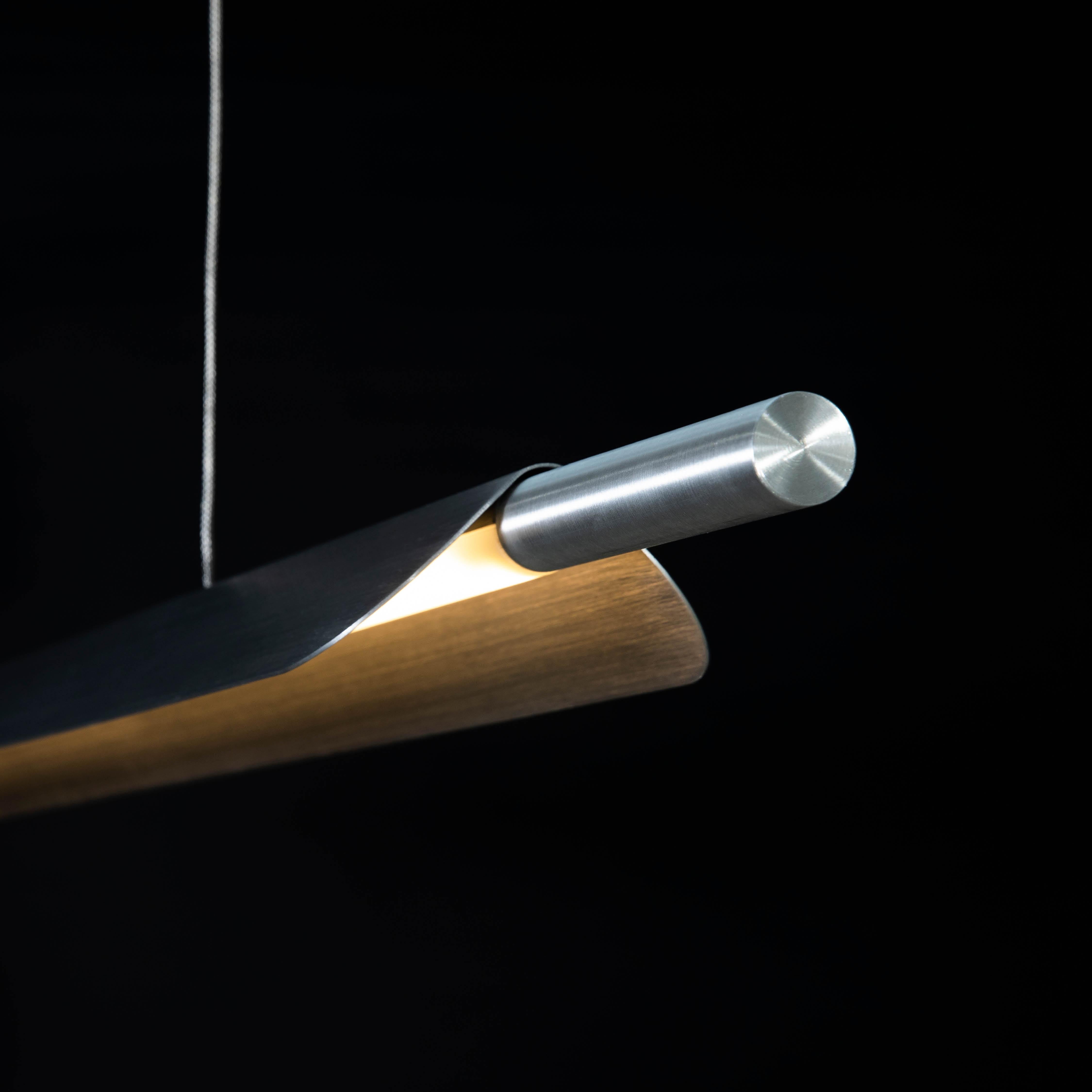 ‘Heavy Metal’ by B-TD. A new series of hand-brushed satin finishes highlighting the elemental beauty of raw metal. 

Formation linear pendant is a sleek, luxurious fixture ideally suited to hang above Kitchen islands, dining tables, workspaces,