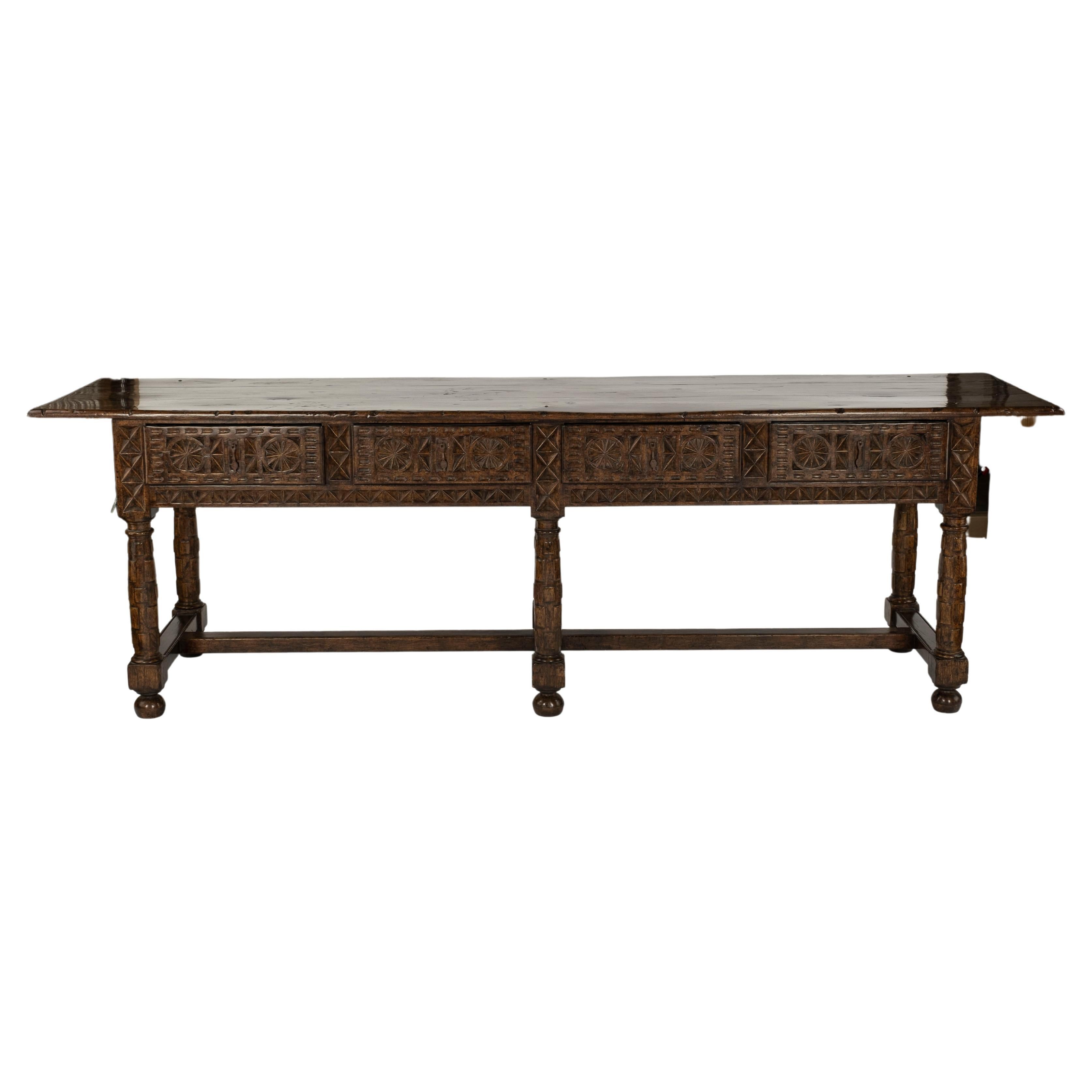 A Spanish Console in patinated walnut in pristine condition.  Beautiful workmanship made to look antique.