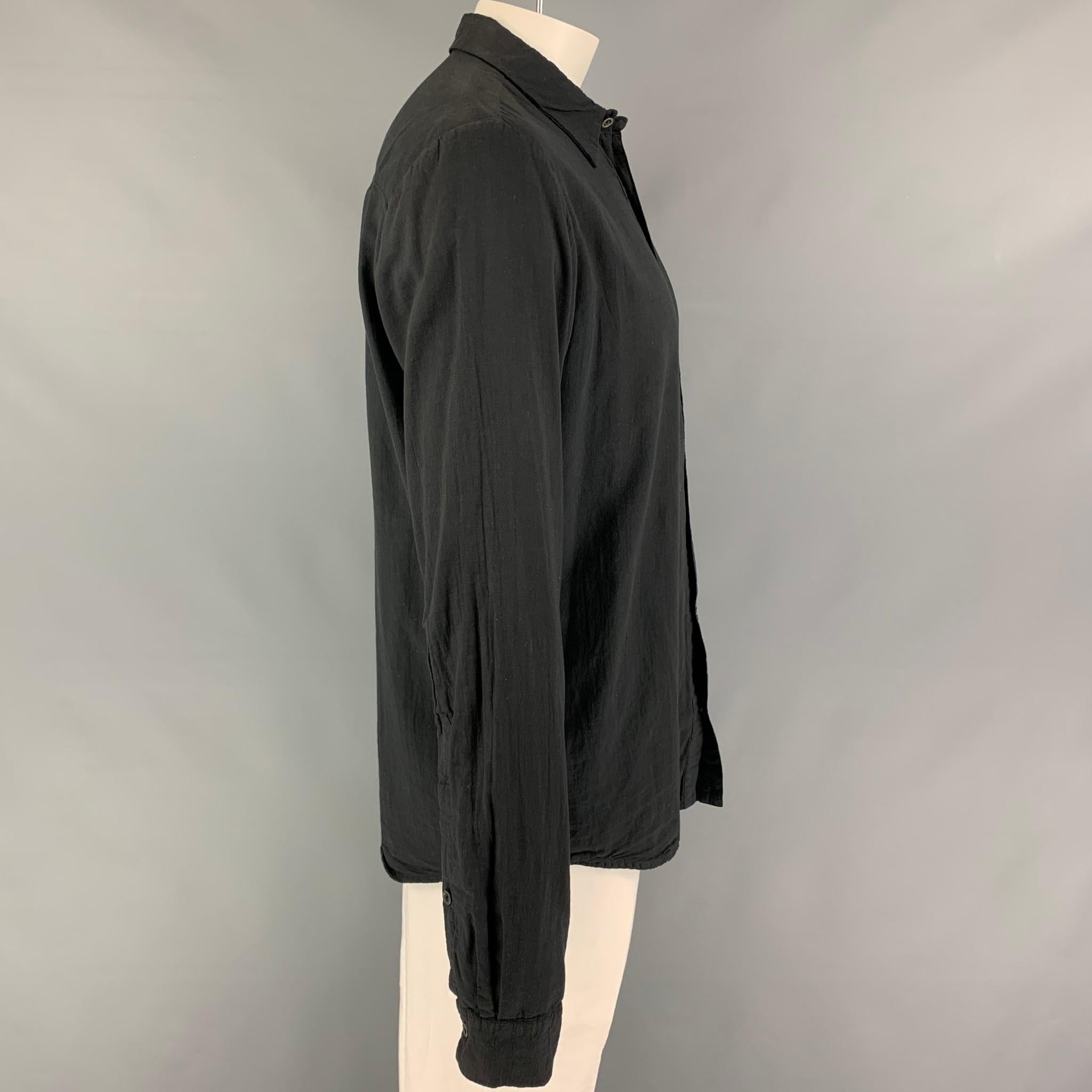 FORME 3’3204322896  long sleeve shirt comes in a black cotton featuring a spread collar and a button up closure. Made in Italy. 

Very Good Pre-Owned Condition.
Marked: 52

Measurements:

Shoulder: 19 in.
Chest: 42 in.
Sleeve: 30 in.
Length: 31 in.