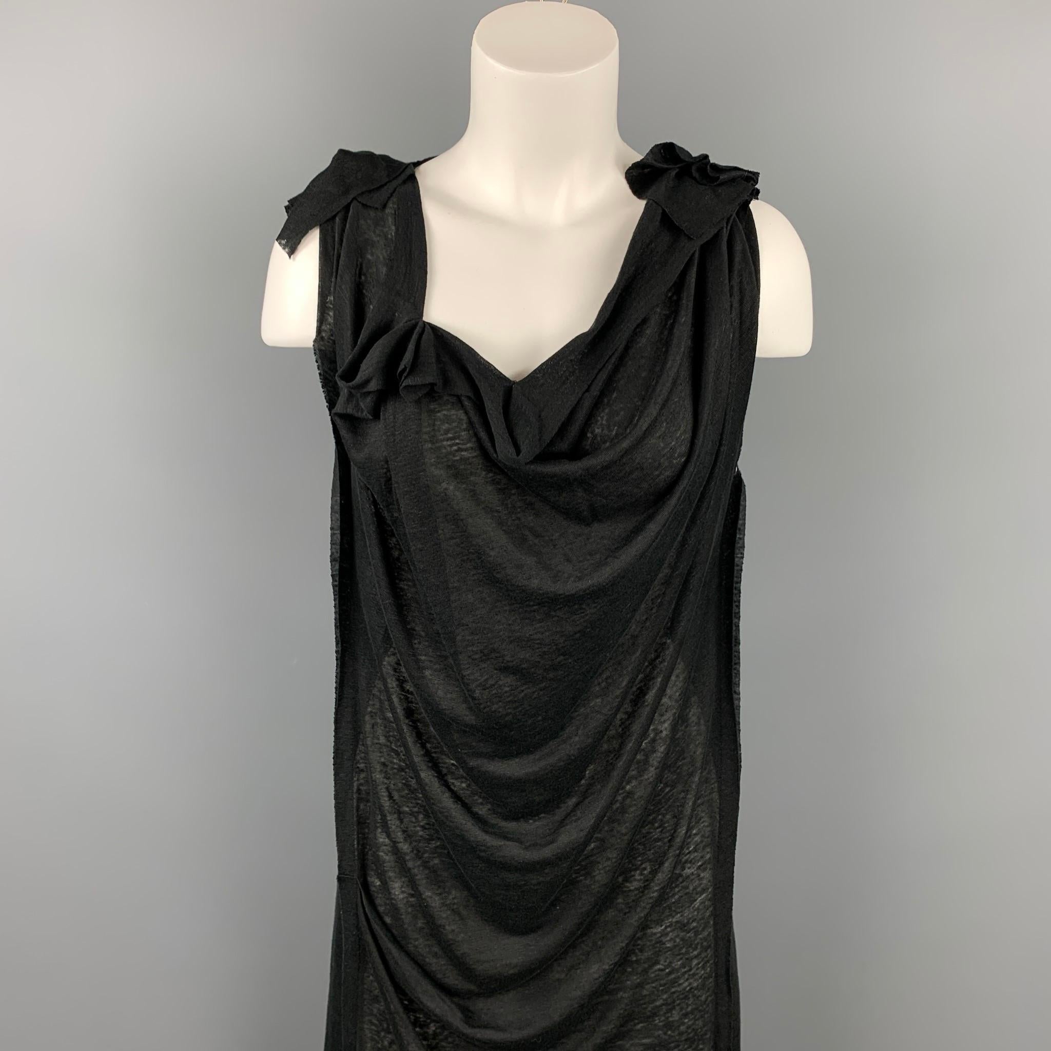 FORME 3’3204322896 dress comes in a black jersey linen featuring a shift style and a ruffled front. Made in Italy.

Very Good Pre-Owned Condition.
Marked: S

Measurements:

Bust: 30 in.
Hip: 35 in.
Length: 43 in. 