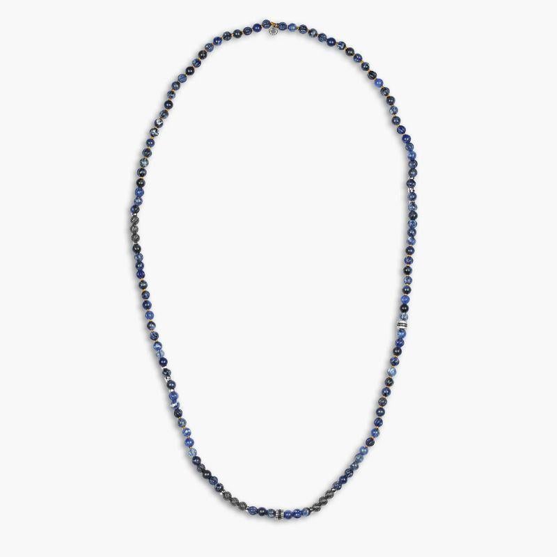 Formentera Layered Necklace in Sodalite and Silver

Inspired by the tranquil sister island of Ibiza with its turquoise clear waters and sandy beaches. The blue sodalite beads are separated by our signature silver elements, which include handmade