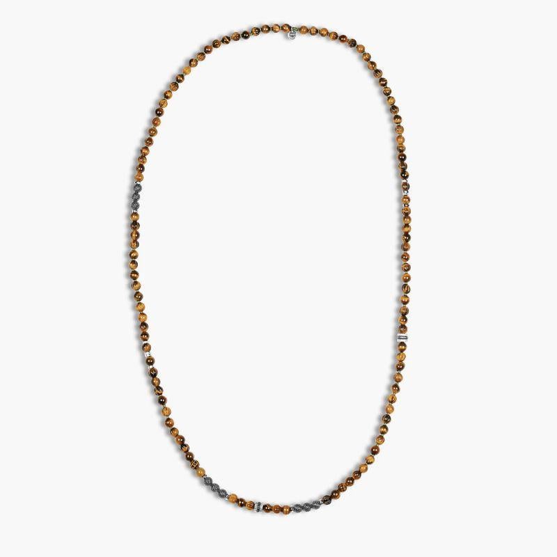 Formentera Layered Necklace in Tiger Eye and Silver

Inspired by the tranquil sister island of Ibiza with its turquoise clear waters and sandy beaches. The tiger eye beads are separated by our signature silver elements, which include handmade