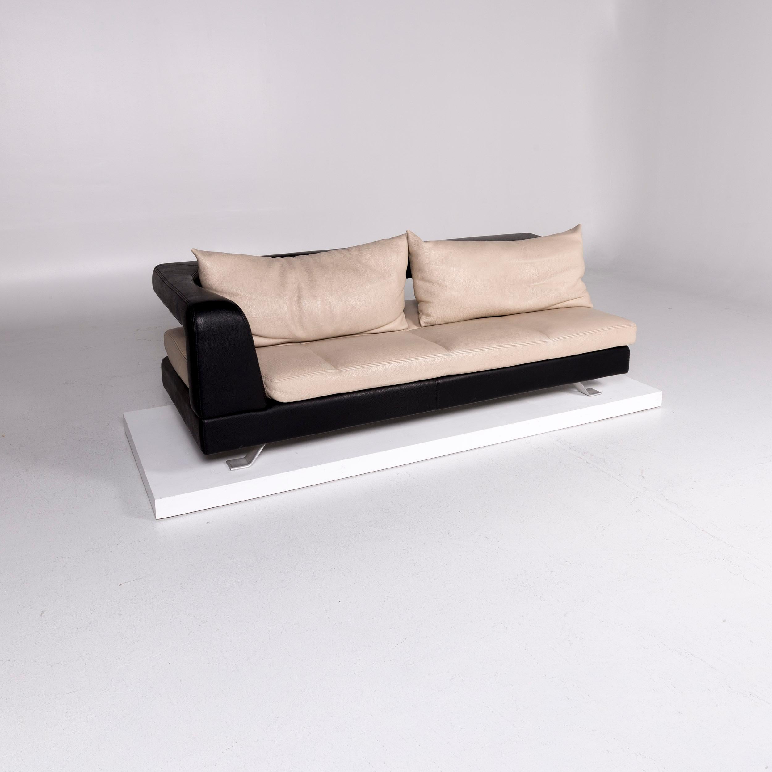 We bring to you a Formenti leather sofa set cream dark brown 1 three-seat 1 stool.

 Product measurements in centimeters:
 
Depth 95
Width 217
Height 72
Seat-height 40
Rest-height 73
Seat-depth 43
Seat-width 189
Back-height 32.
 