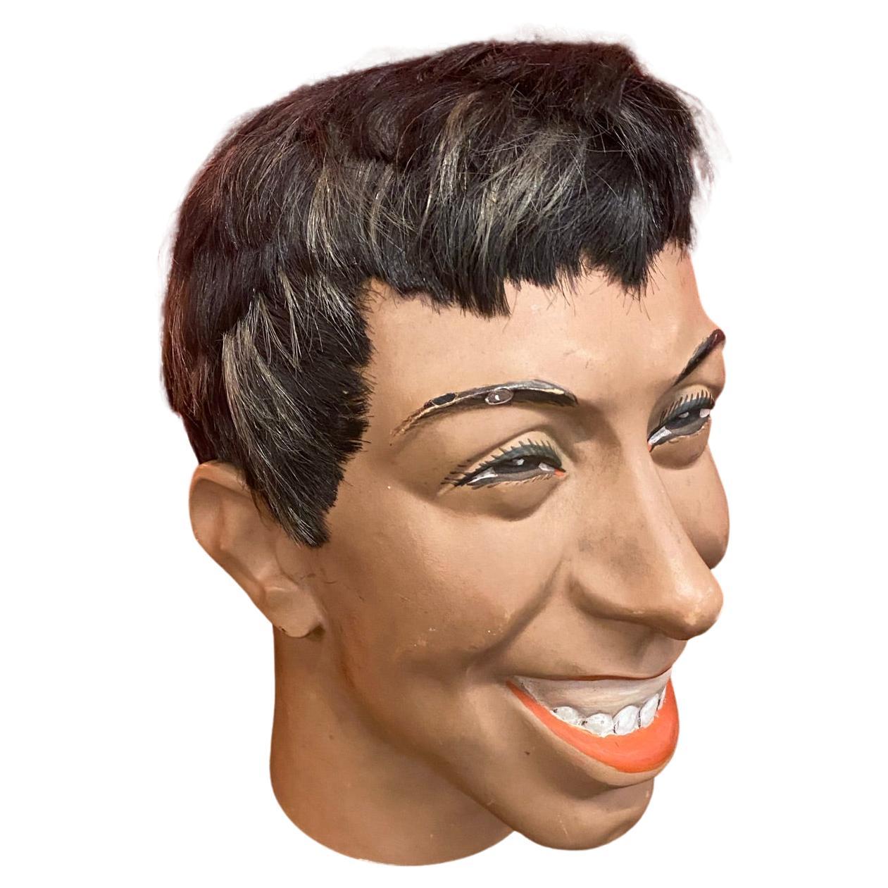 Antigua cabeza de maniquí que representa al actor francés Fernandel, hacia 1960 en venta