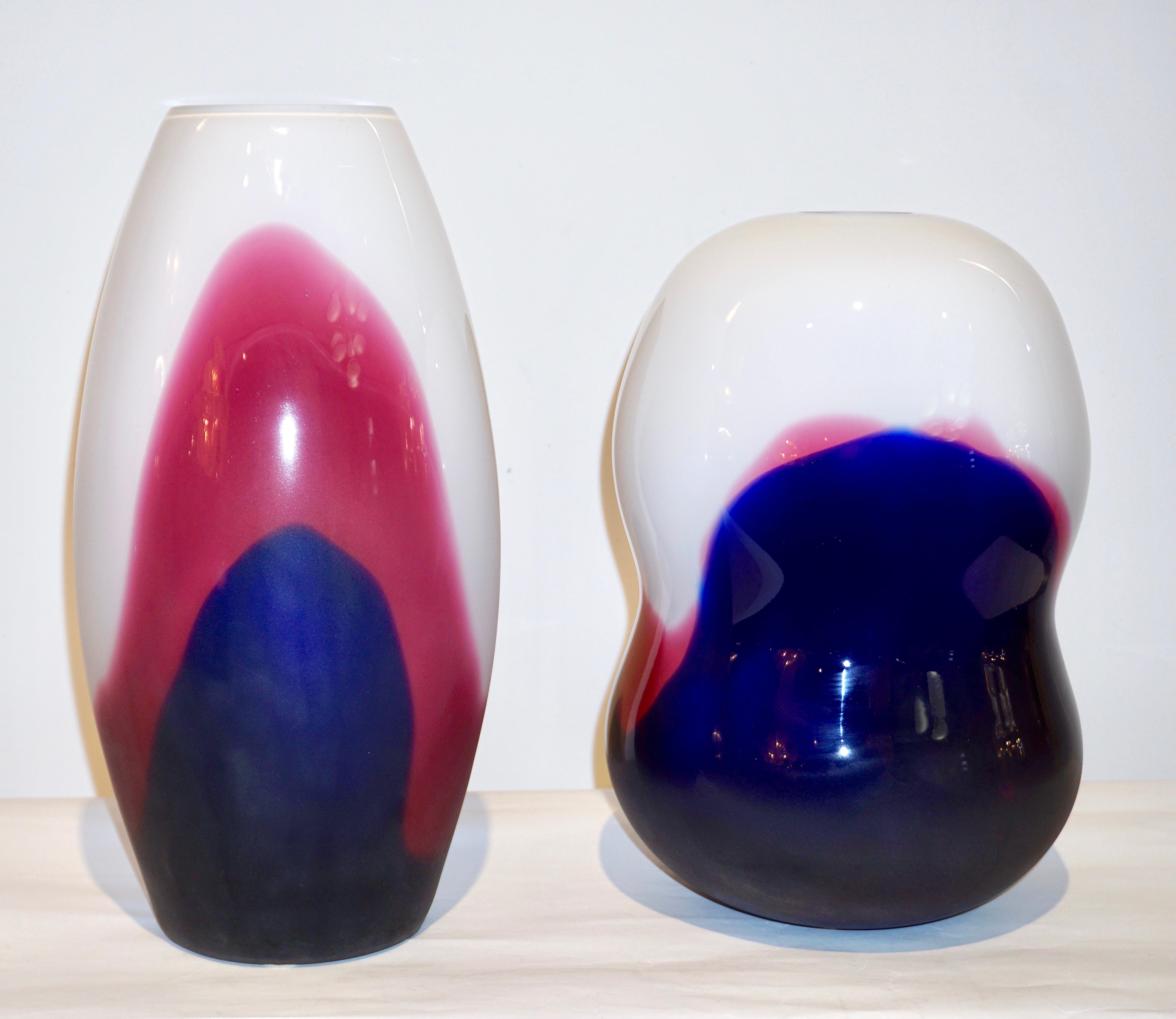 Two vases in blown Murano Art glass signed Formia, created exclusively for Roche Bobois Paris. The very modern minimalist design and execution are striking in the luxurious quality of glass, that resembles enamel, multi layers of glass on ivory