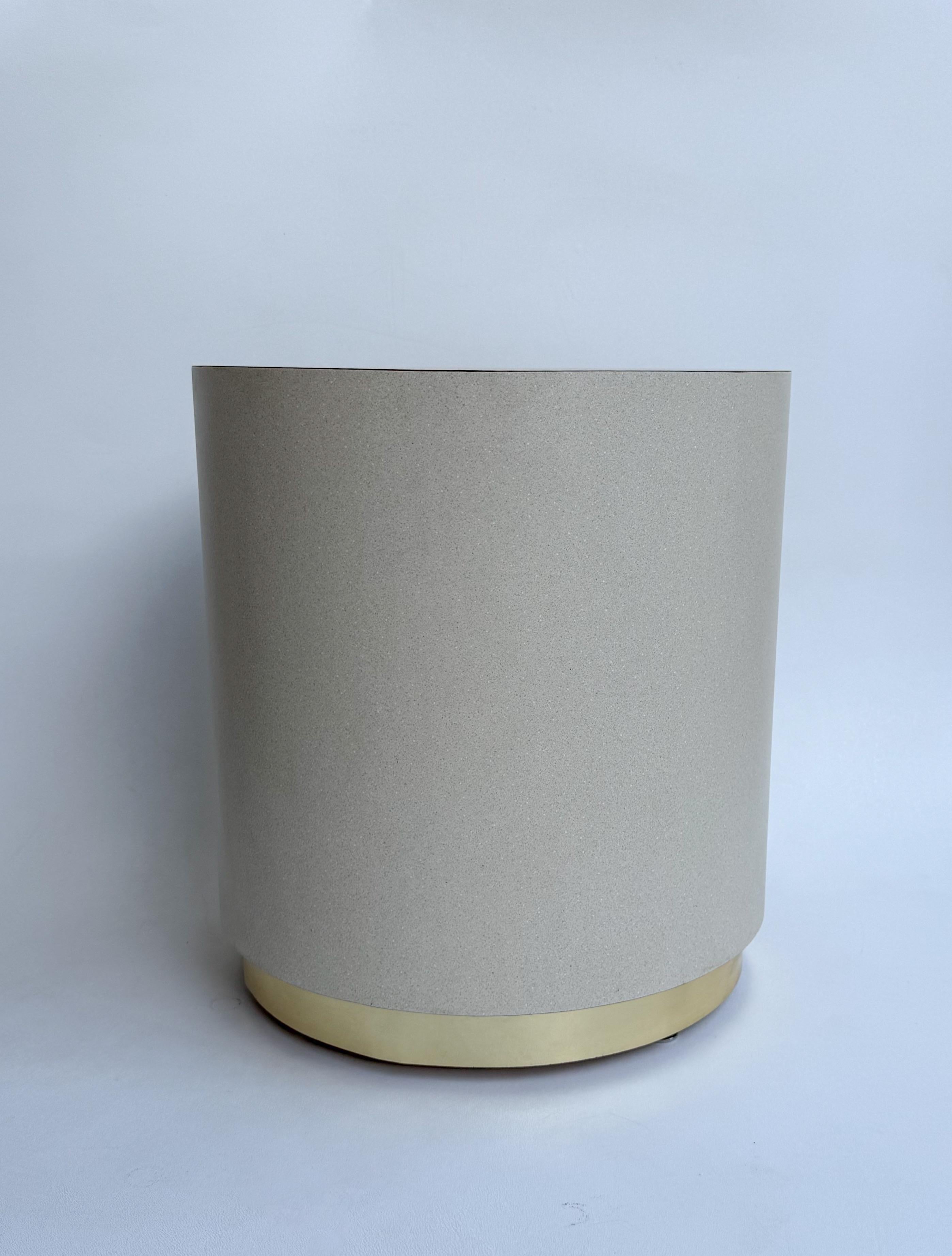 1980’s Formica and brass drum side table by Steve Chase. 
In great original condition. Minor wear consistent with age. 

Measurements: 18.5” Diameter, 20.25” High. 