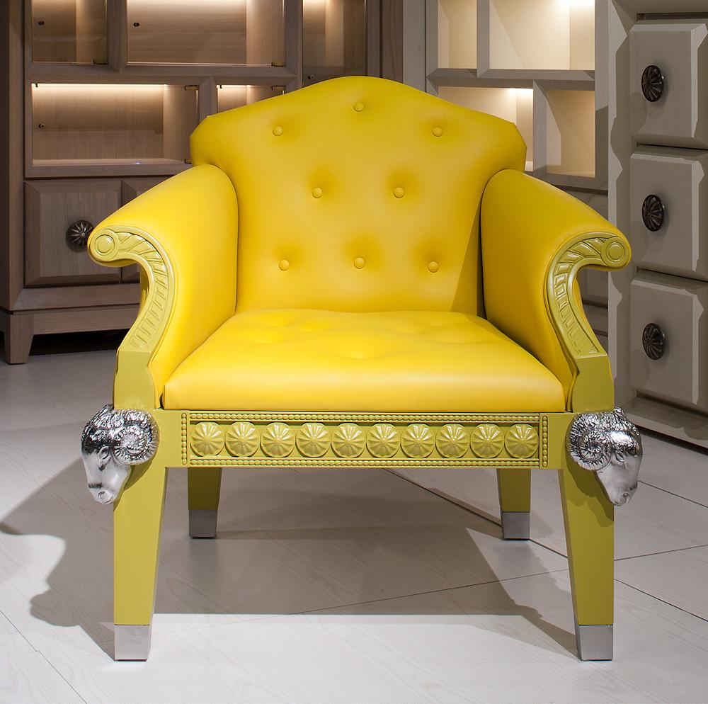 Hand-Carved Formidable Beast Uhpholstered Yellow Armchair with Chrome Rams and Seat Buttons For Sale