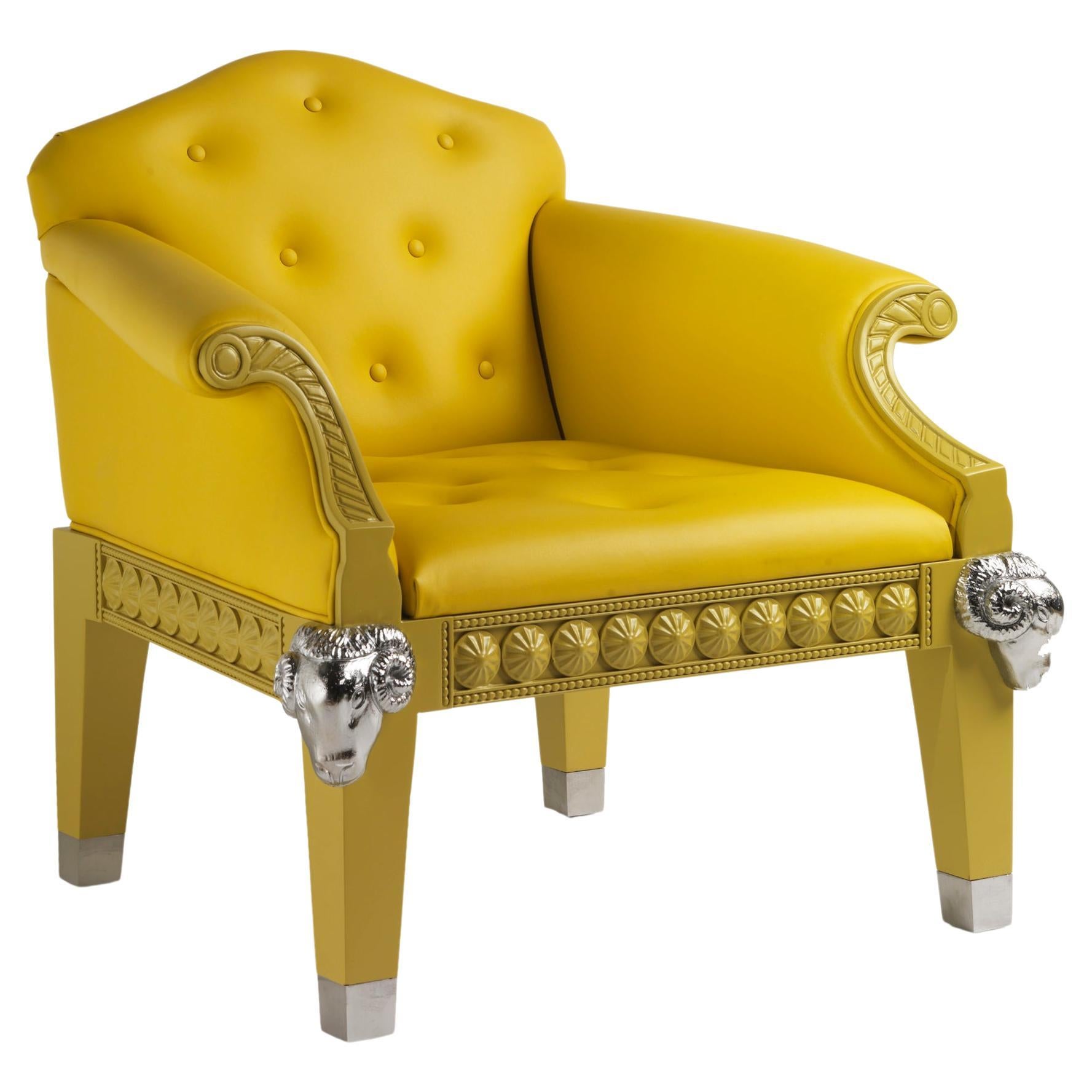 Formidable Beast Uhpholstered Yellow Armchair with Chrome Rams and Seat Buttons For Sale