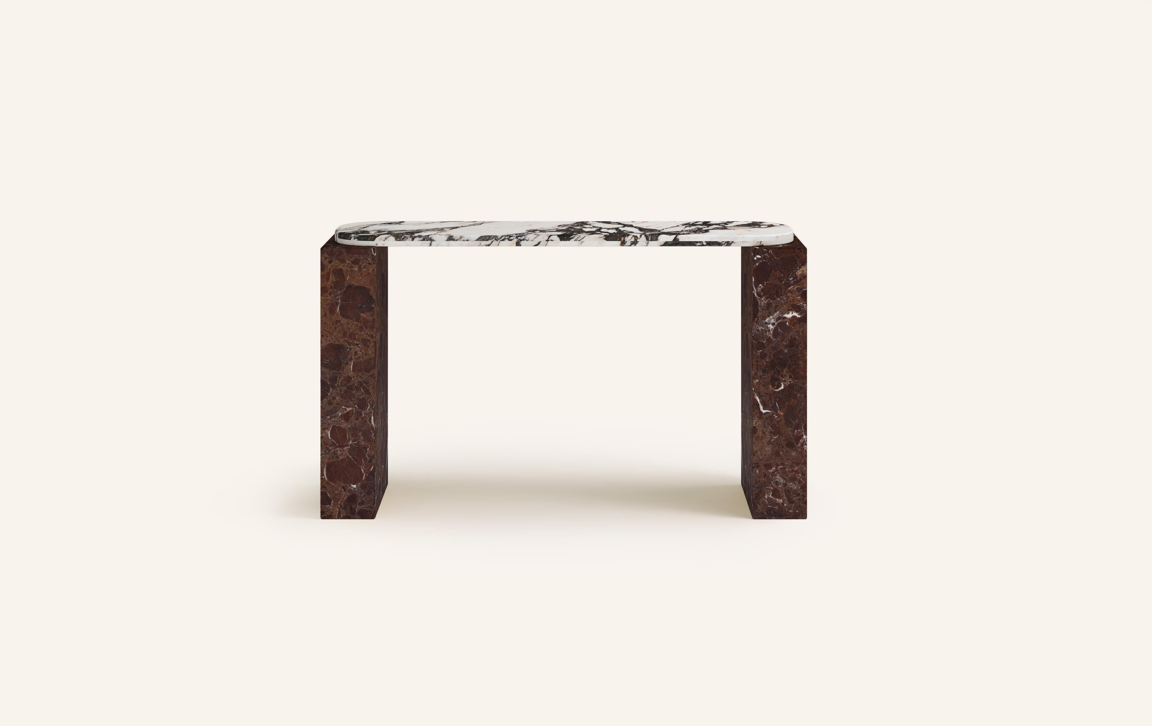 MONOLITHIC FORMS SOFTENED BY GENTLE EDGES. WITH ITS BOLD MARBLE PATTERNS CUBO IS AS VERSATILE AS IT IS STRIKING.

DIMENSIONS:
50”L x 17”W x 36”H: 
- 48”L x 15”W x 1.5” THICK TABLETOP WITH WITH 6