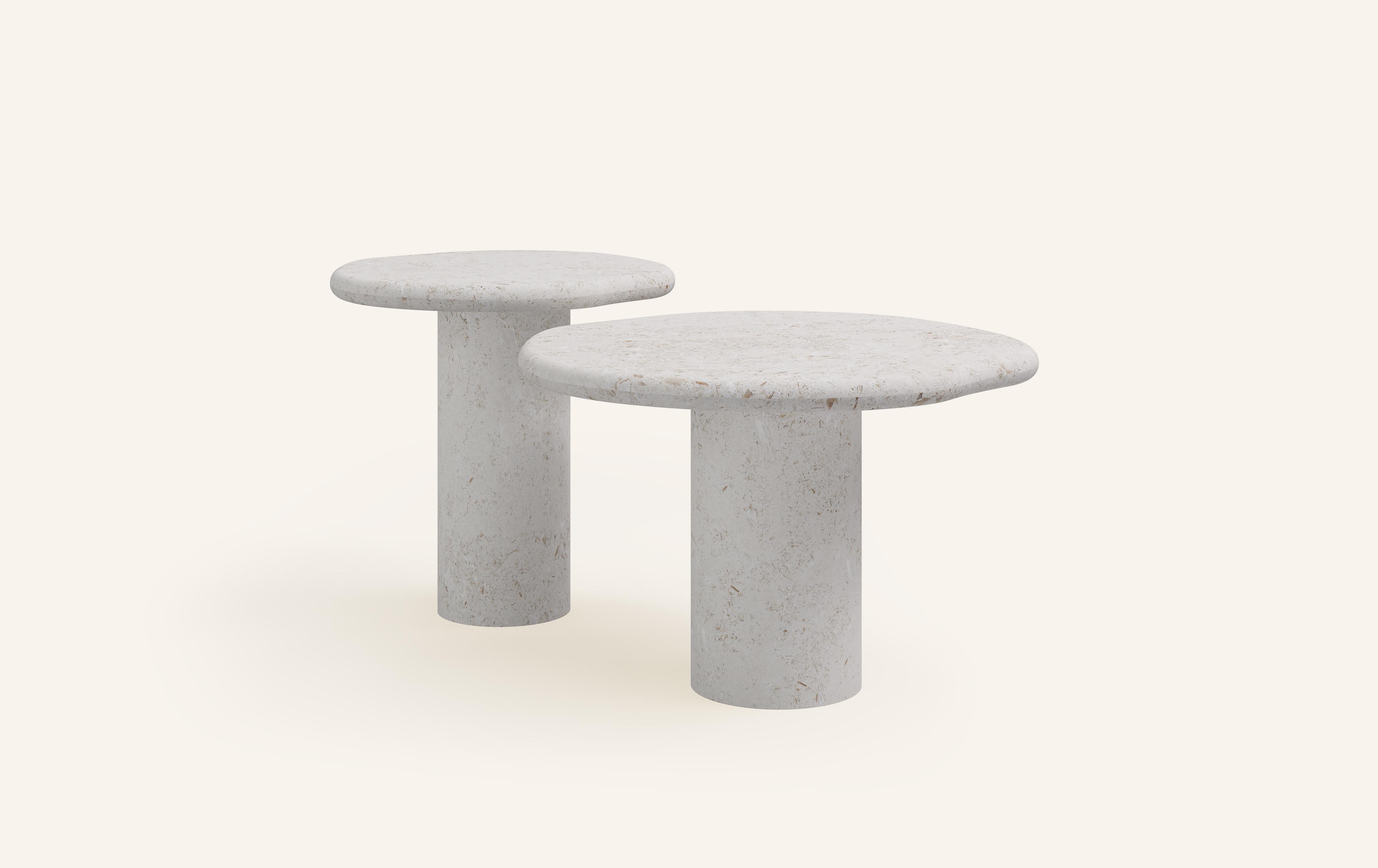 ‘LAGO’, ITALIAN FOR ‘LAKE’, HAS INSPIRED A FORM DERIVED FROM NATURE, TEXTURED WITH LUXURIOUS STONES AND METALS. THE COLLECTION ENCOURAGES NESTING AND LAYERING IN ITS AVAILABLE FORMS.

DIMENSIONS: (SIDE TABLES SOLD INDIVIDUALLY): 
24”L x 24”W x 16”H: