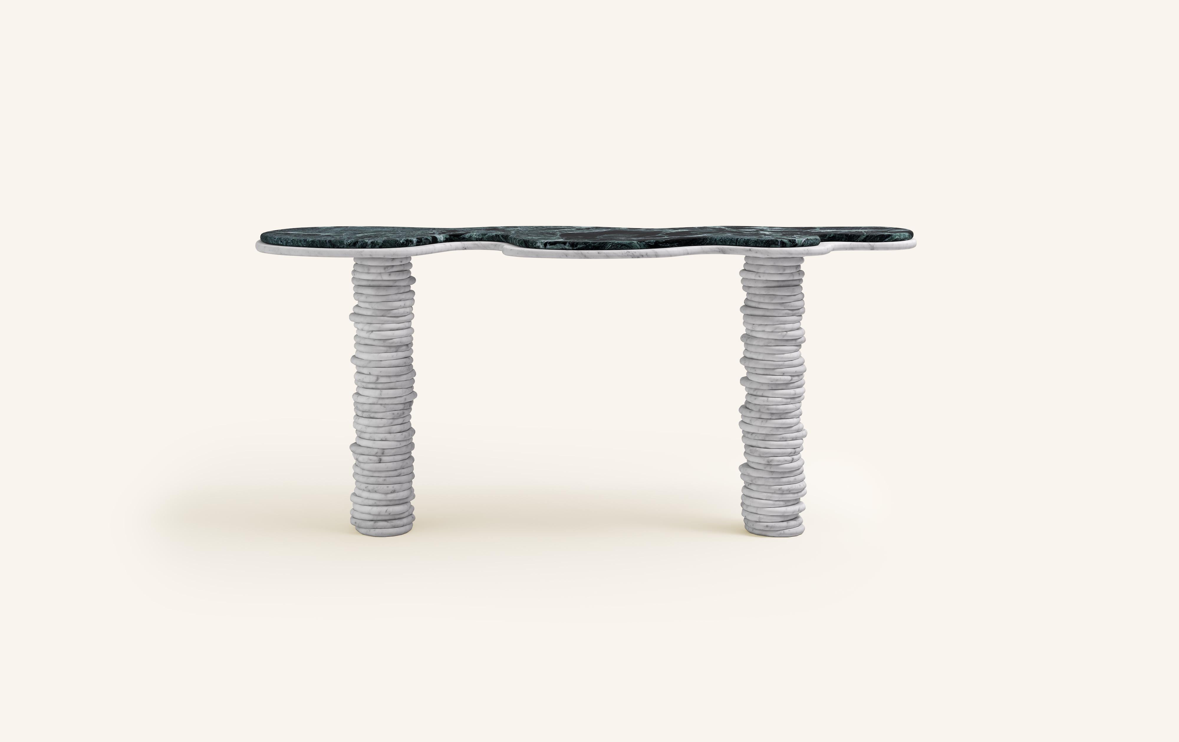 'ONDA', ITALIAN FOR 'WAVE', HAS INSPIRED A FREEFORM ORGANIC BODY, HEROING A COMPLEX AND TEXTURED COLLECTION. COMPRISING SIDE TABLES FOR LAYERING, COFFEE TABLES AND DINING TABLES.

DIMENSIONS:
60”L x 18”W x 29-3/4”H: 
- 1.5