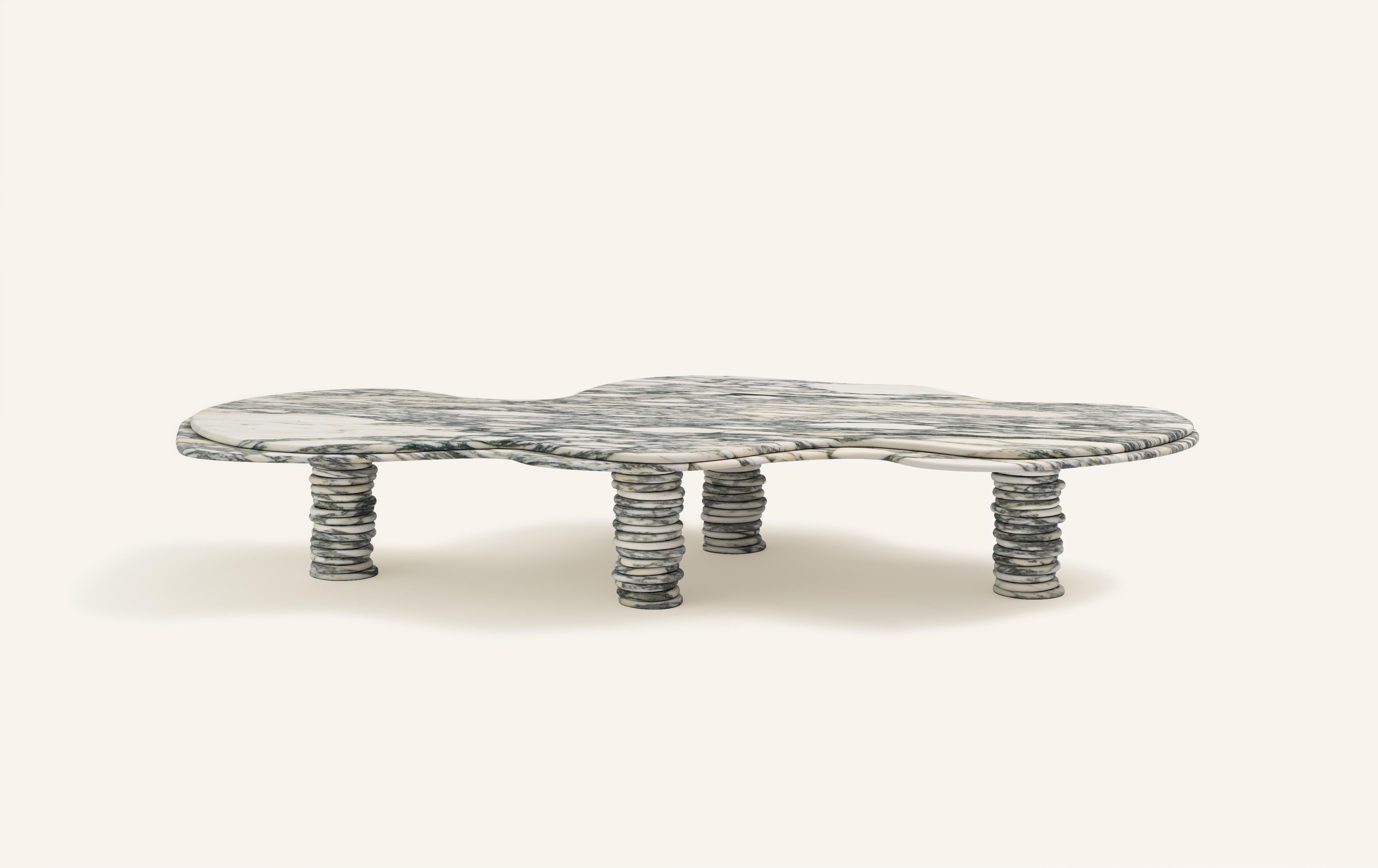 'ONDA', ITALIAN FOR 'WAVE', HAS INSPIRED A FREEFORM ORGANIC BODY, HEROING A COMPLEX AND TEXTURED COLLECTION. COMPRISING SIDE TABLES FOR LAYERING, COFFEE TABLES AND DINING TABLES.

DIMENSIONS:
84”L x 46”W x 14-3/16”H: 
- 1.5