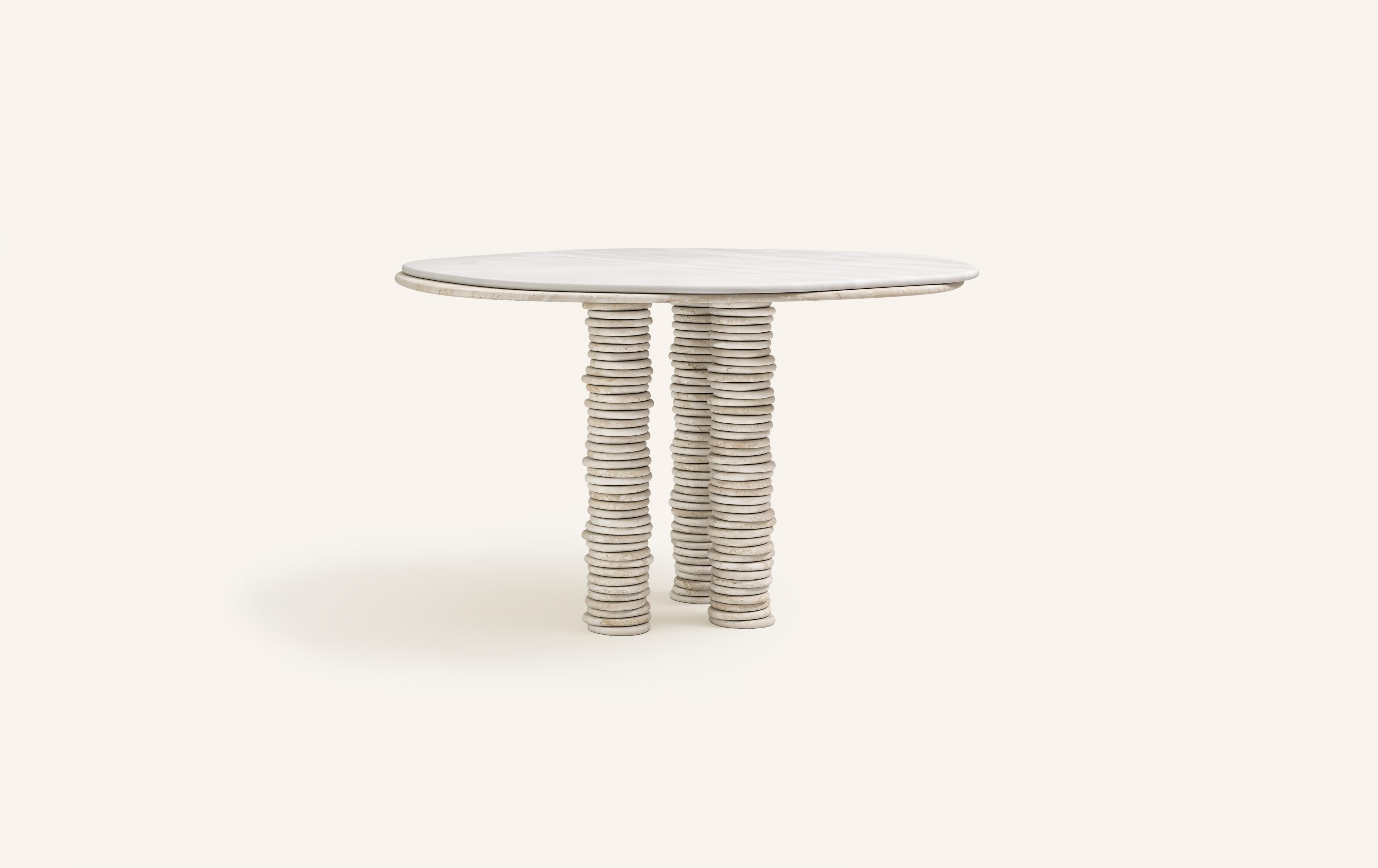 'ONDA', ITALIAN FOR 'WAVE', HAS INSPIRED A FREEFORM ORGANIC BODY, HEROING A COMPLEX AND TEXTURED COLLECTION. COMPRISING SIDE TABLES FOR LAYERING, COFFEE TABLES AND DINING TABLES.

DIMENSIONS:
54”L x 54”W x 29-3/4”H: 
- 1.5