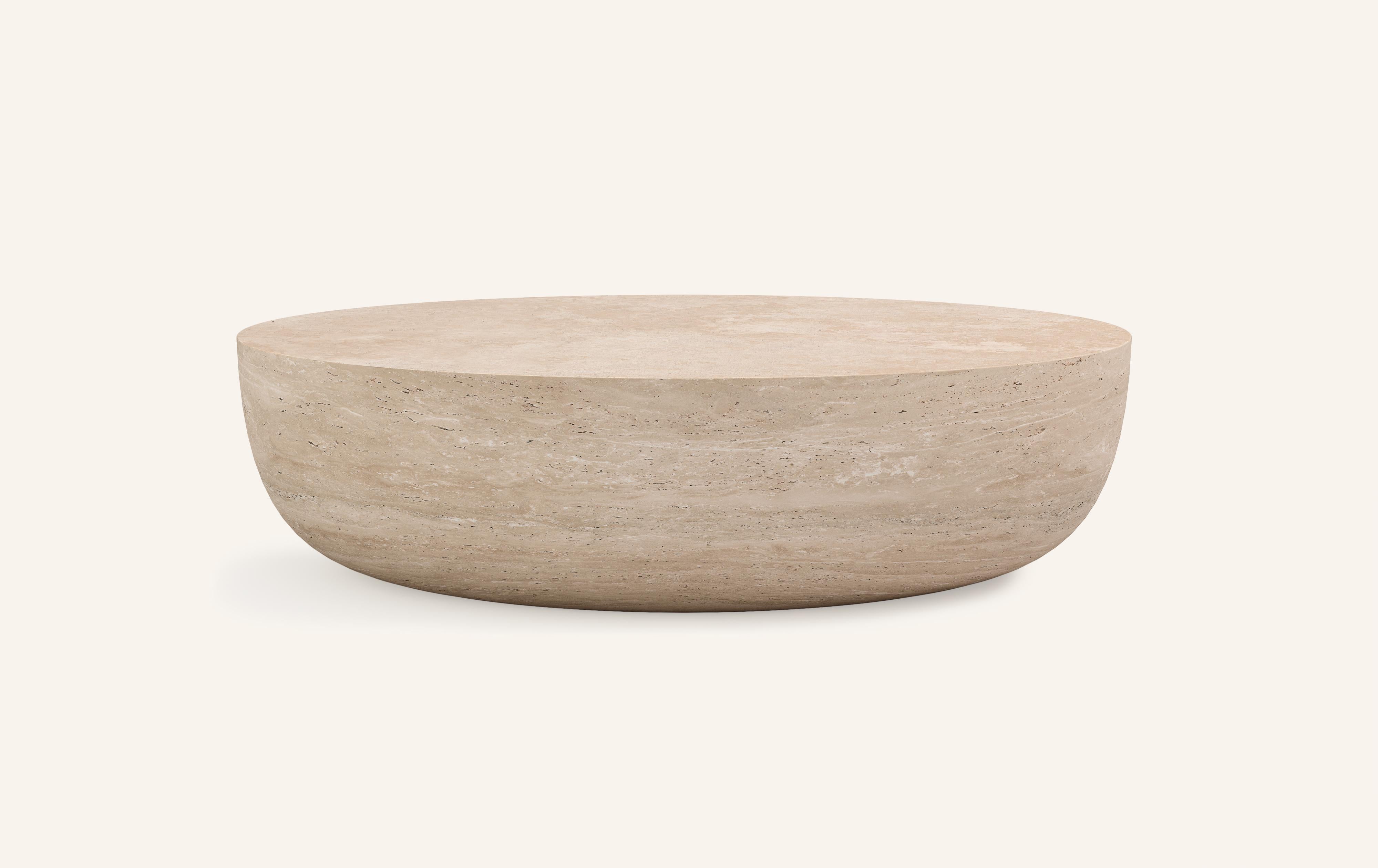 A SLICE OF A ’SPHERE’ OR 'SFERA' IN ITALIAN BALANCES A FLAT SURFACE ATOP AND ROBUST MONOLITH FORM. WITH A BASE SOFTENED BY A CURVED PROFILE, SFERA IS SOFT AND EARTHY IN ITS AVAILABLE STONE SELECTIONS.

DIMENSIONS: 
48”L x 36”W x 16”H: 
- SOLID BLOCK