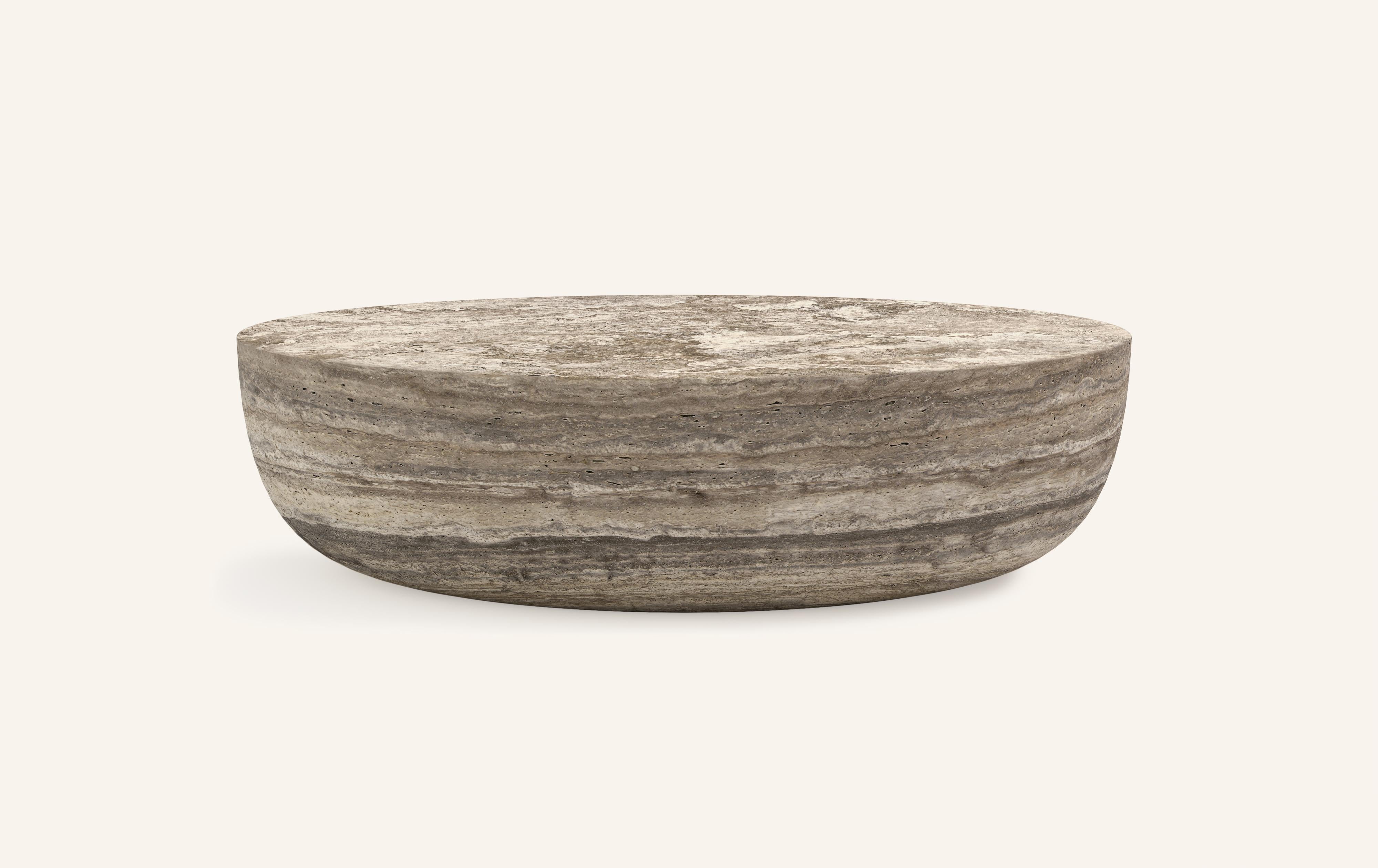 A SLICE OF A ’SPHERE’ OR 'SFERA' IN ITALIAN BALANCES A FLAT SURFACE ATOP AND ROBUST MONOLITH FORM. WITH A BASE SOFTENED BY A CURVED PROFILE, SFERA IS SOFT AND EARTHY IN ITS AVAILABLE STONE SELECTIONS.

DIMENSIONS: 
60”L x 42”W x 16”H: 
- SOLID BLOCK