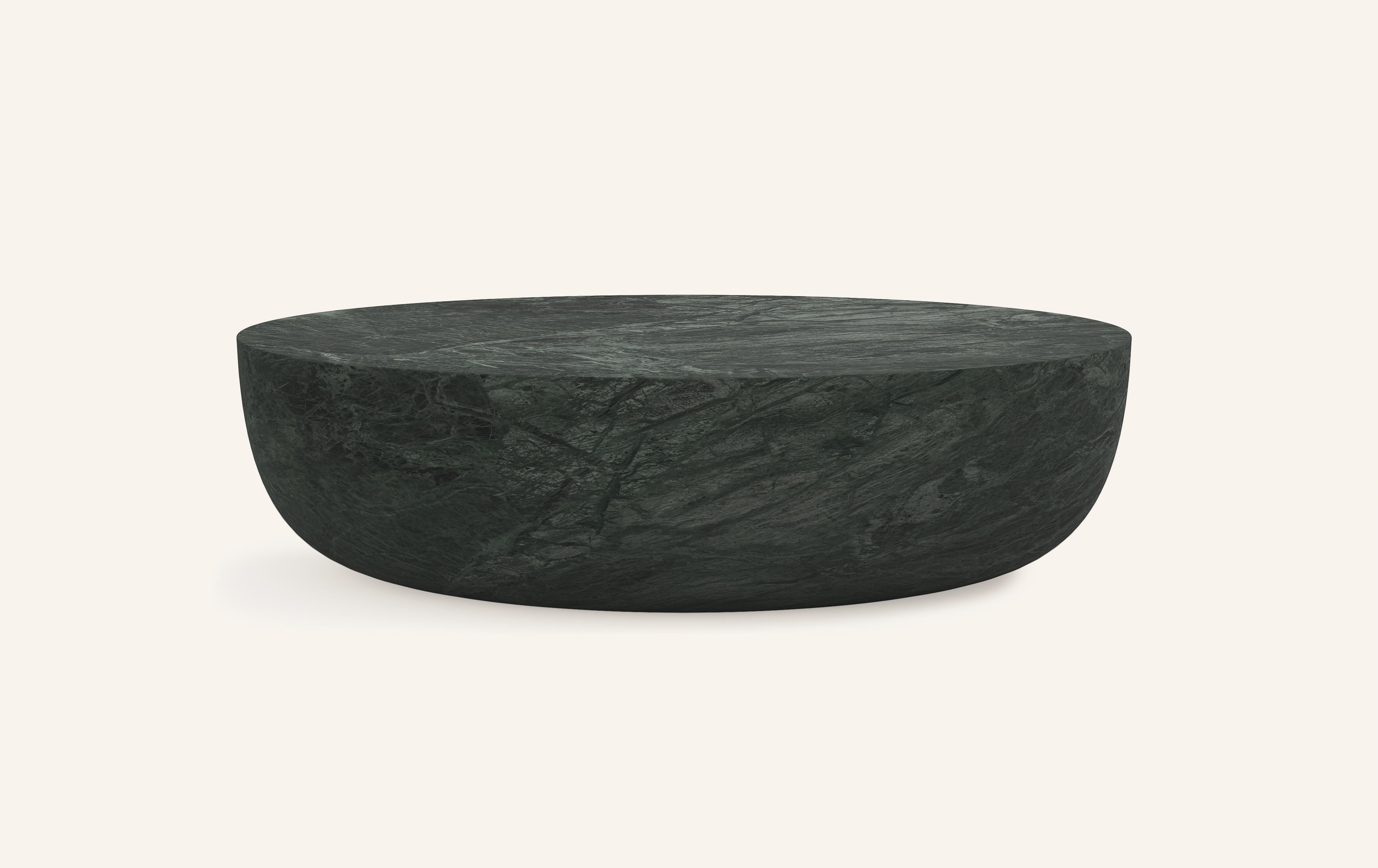 A SLICE OF A ’SPHERE’ OR 'SFERA' IN ITALIAN BALANCES A FLAT SURFACE ATOP AND ROBUST MONOLITH FORM. WITH A BASE SOFTENED BY A CURVED PROFILE, SFERA IS SOFT AND EARTHY IN ITS AVAILABLE STONE SELECTIONS.

DIMENSIONS: 
60”L x 42”W x 16”H: 
- SOLID BLOCK