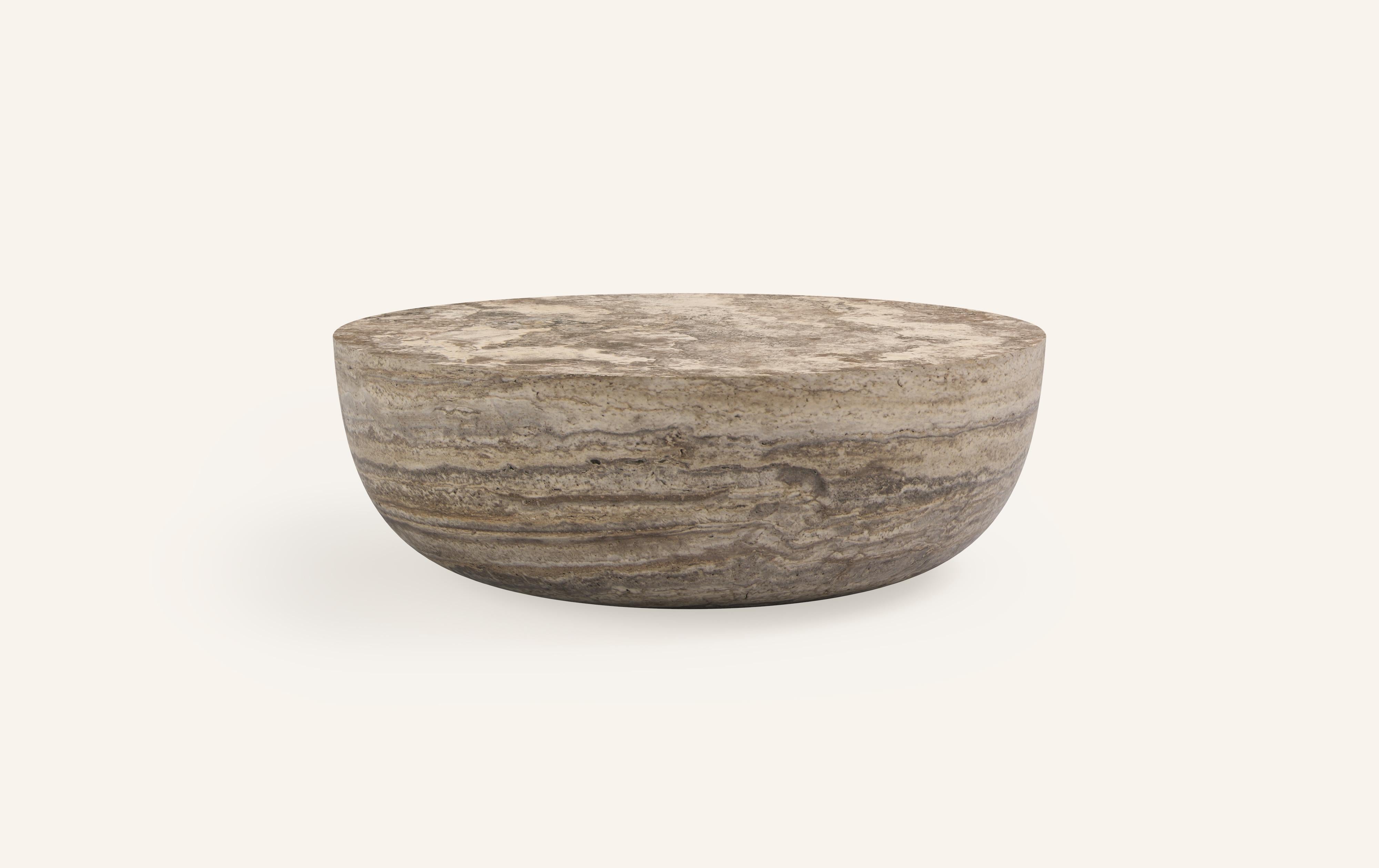 A SLICE OF A ’SPHERE’ OR 'SFERA' IN ITALIAN BALANCES A FLAT SURFACE ATOP AND ROBUST MONOLITH FORM. WITH A BASE SOFTENED BY A CURVED PROFILE, SFERA IS SOFT AND EARTHY IN ITS AVAILABLE STONE SELECTIONS.

DIMENSIONS: 
36”L x 36”W x 16”H: 
- SOLID BLOCK