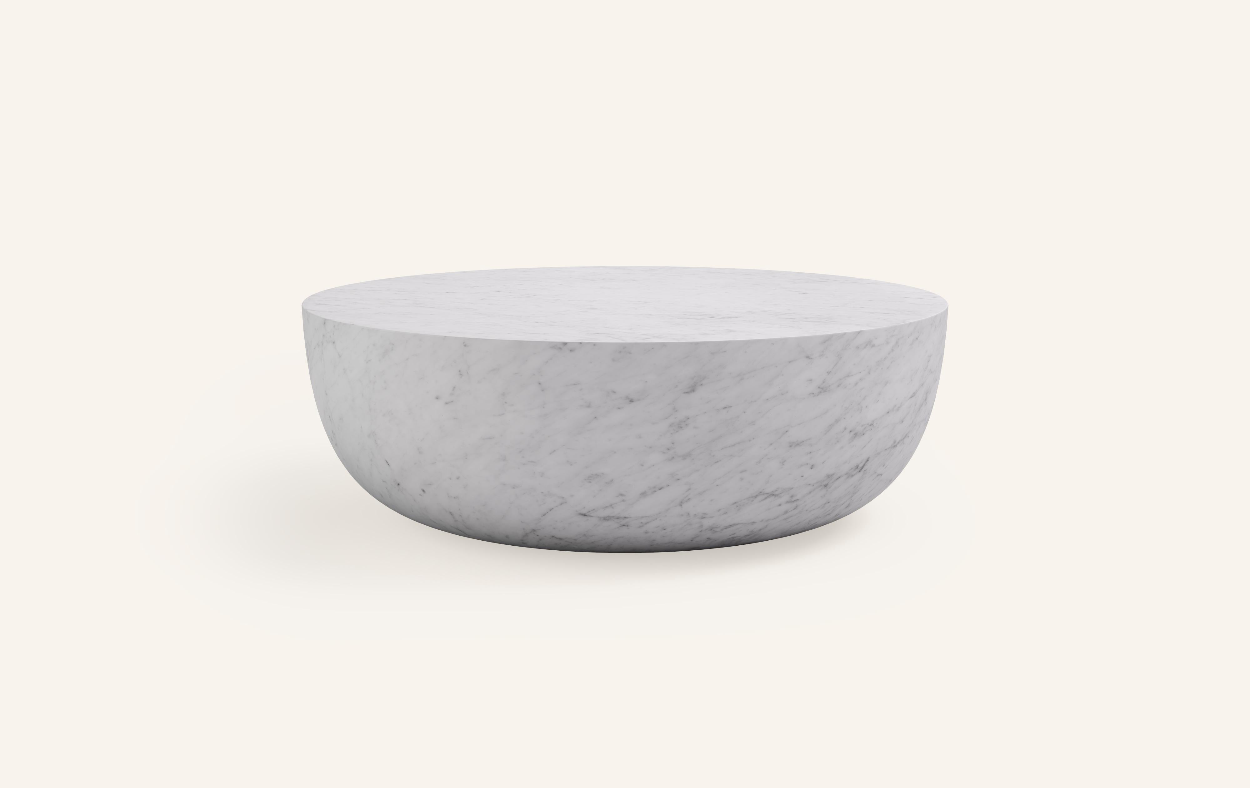 A SLICE OF A ’SPHERE’ OR 'SFERA' IN ITALIAN BALANCES A FLAT SURFACE ATOP AND ROBUST MONOLITH FORM. WITH A BASE SOFTENED BY A CURVED PROFILE, SFERA IS SOFT AND EARTHY IN ITS AVAILABLE STONE SELECTIONS.

DIMENSIONS: 
42”L x 42”W x 16”H: 
- SOLID