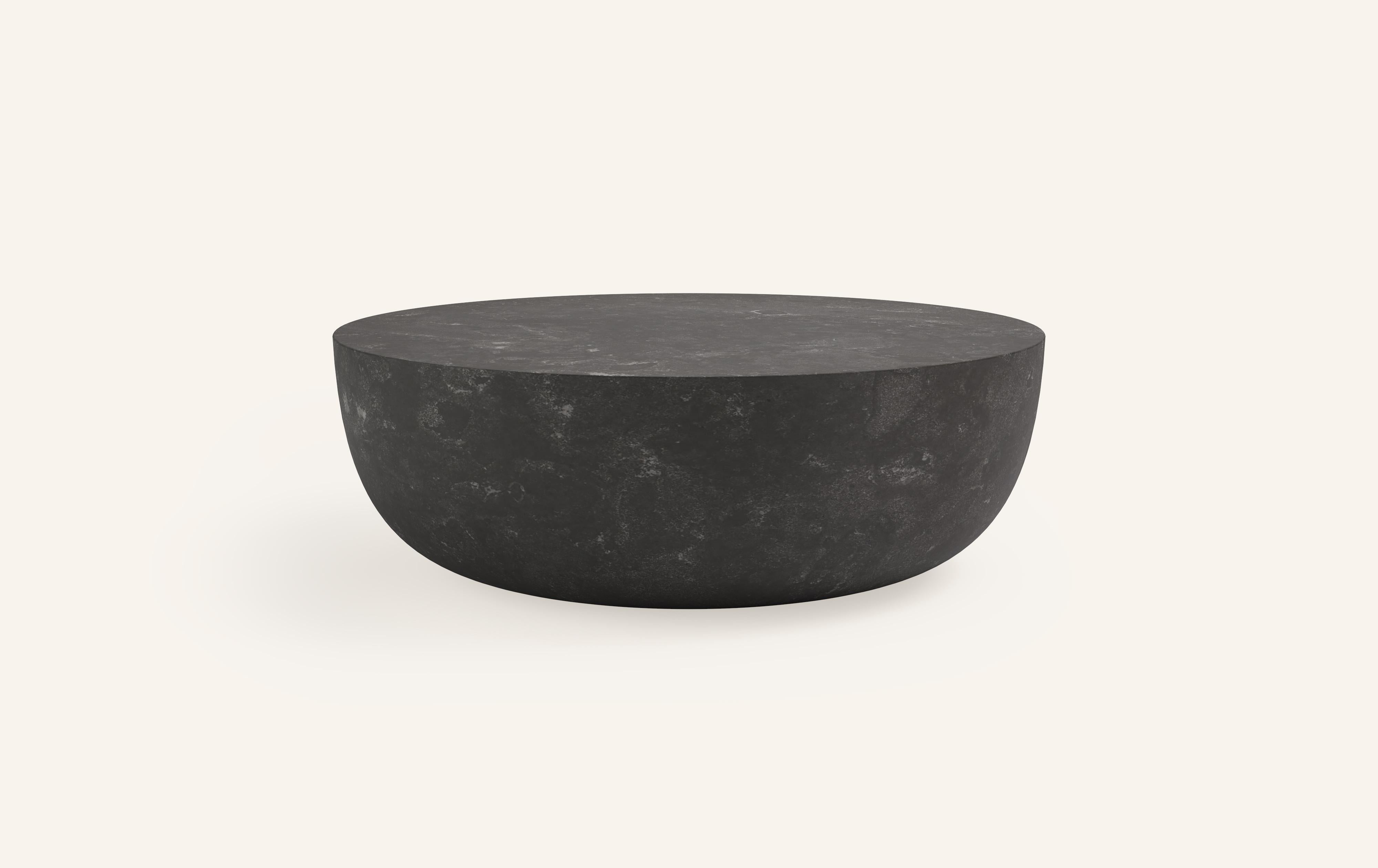 A SLICE OF A ’SPHERE’ OR 'SFERA' IN ITALIAN BALANCES A FLAT SURFACE ATOP AND ROBUST MONOLITH FORM. WITH A BASE SOFTENED BY A CURVED PROFILE, SFERA IS SOFT AND EARTHY IN ITS AVAILABLE STONE SELECTIONS.

DIMENSIONS: 
42”L x 42”W x 16”H: 
- SOLID