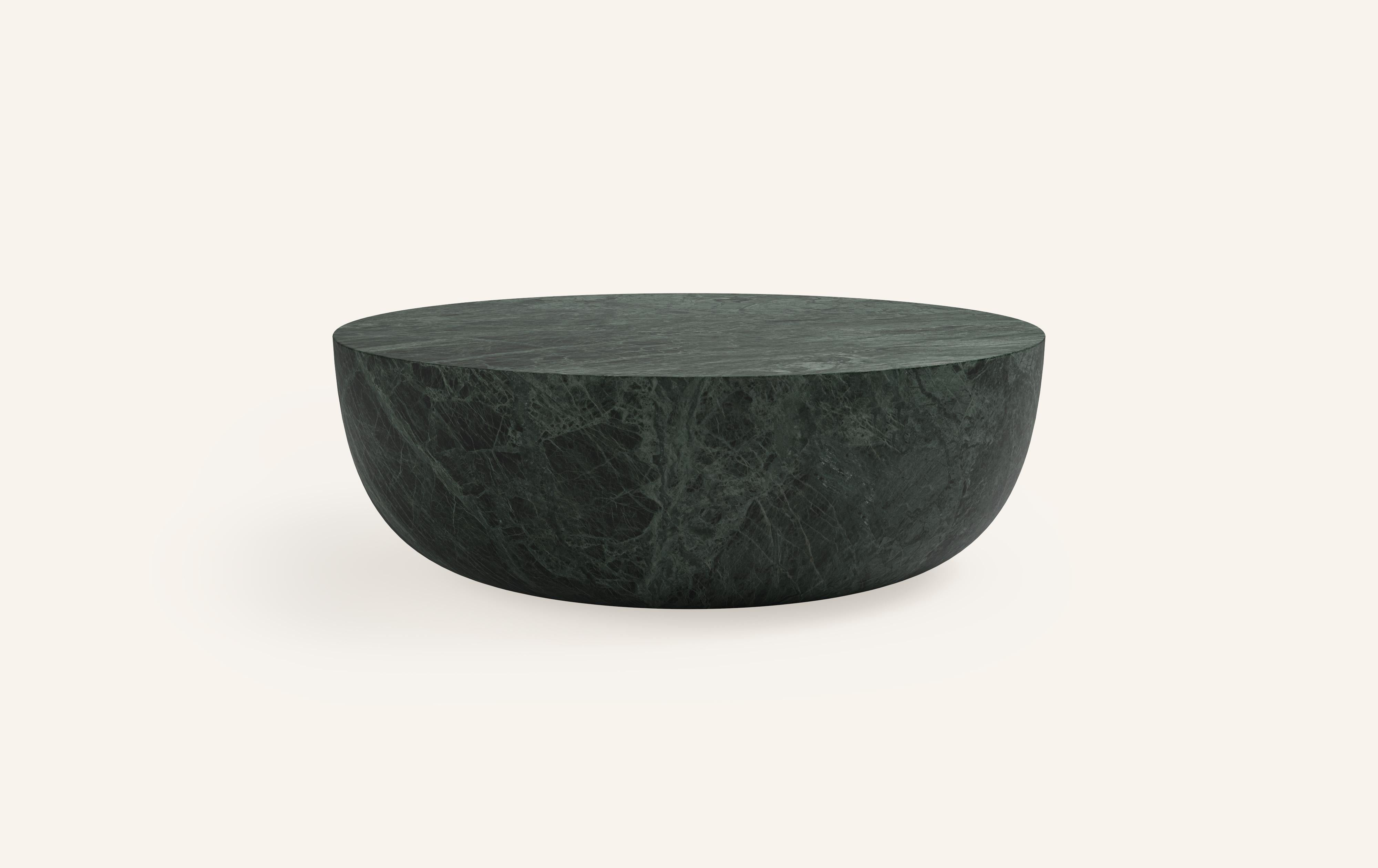 A SLICE OF A ’SPHERE’ OR 'SFERA' IN ITALIAN BALANCES A FLAT SURFACE ATOP AND ROBUST MONOLITH FORM. WITH A BASE SOFTENED BY A CURVED PROFILE, SFERA IS SOFT AND EARTHY IN ITS AVAILABLE STONE SELECTIONS.

DIMENSIONS: 
42”L x 42”W x 16”H: 
- SOLID