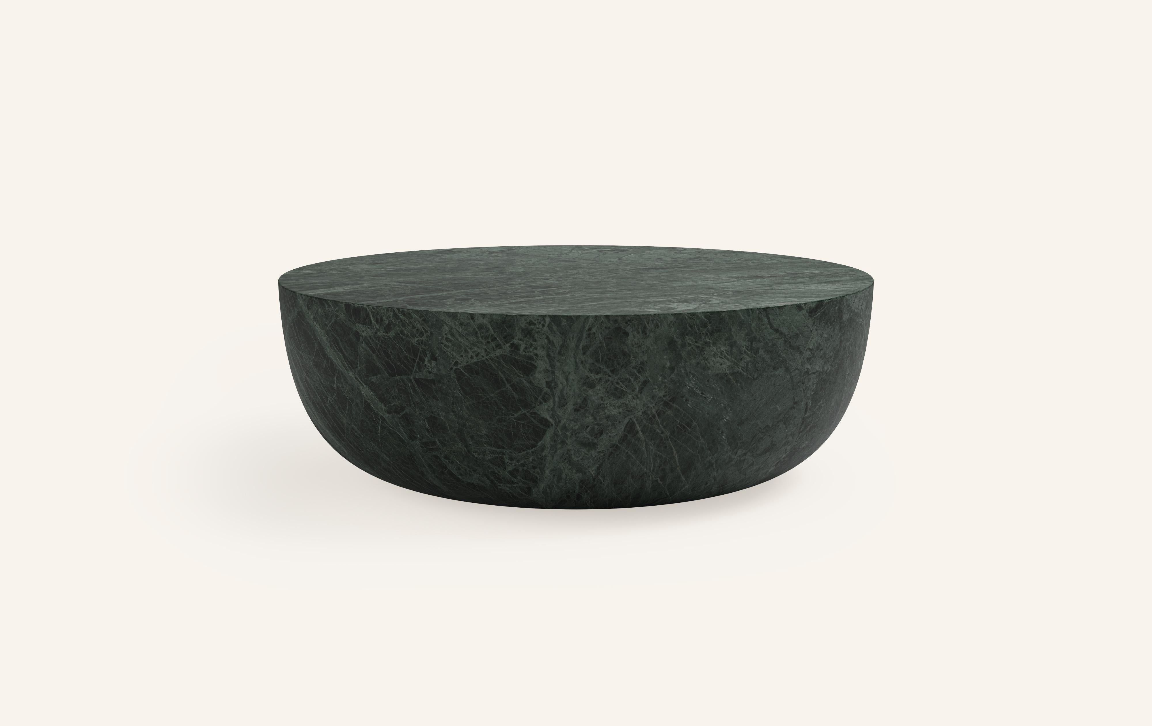 A SLICE OF A ’SPHERE’ OR 'SFERA' IN ITALIAN BALANCES A FLAT SURFACE ATOP AND ROBUST MONOLITH FORM. WITH A BASE SOFTENED BY A CURVED PROFILE, SFERA IS SOFT AND EARTHY IN ITS AVAILABLE STONE SELECTIONS.

DIMENSIONS: 
48”L x 48”W x 16”H: 
- SOLID