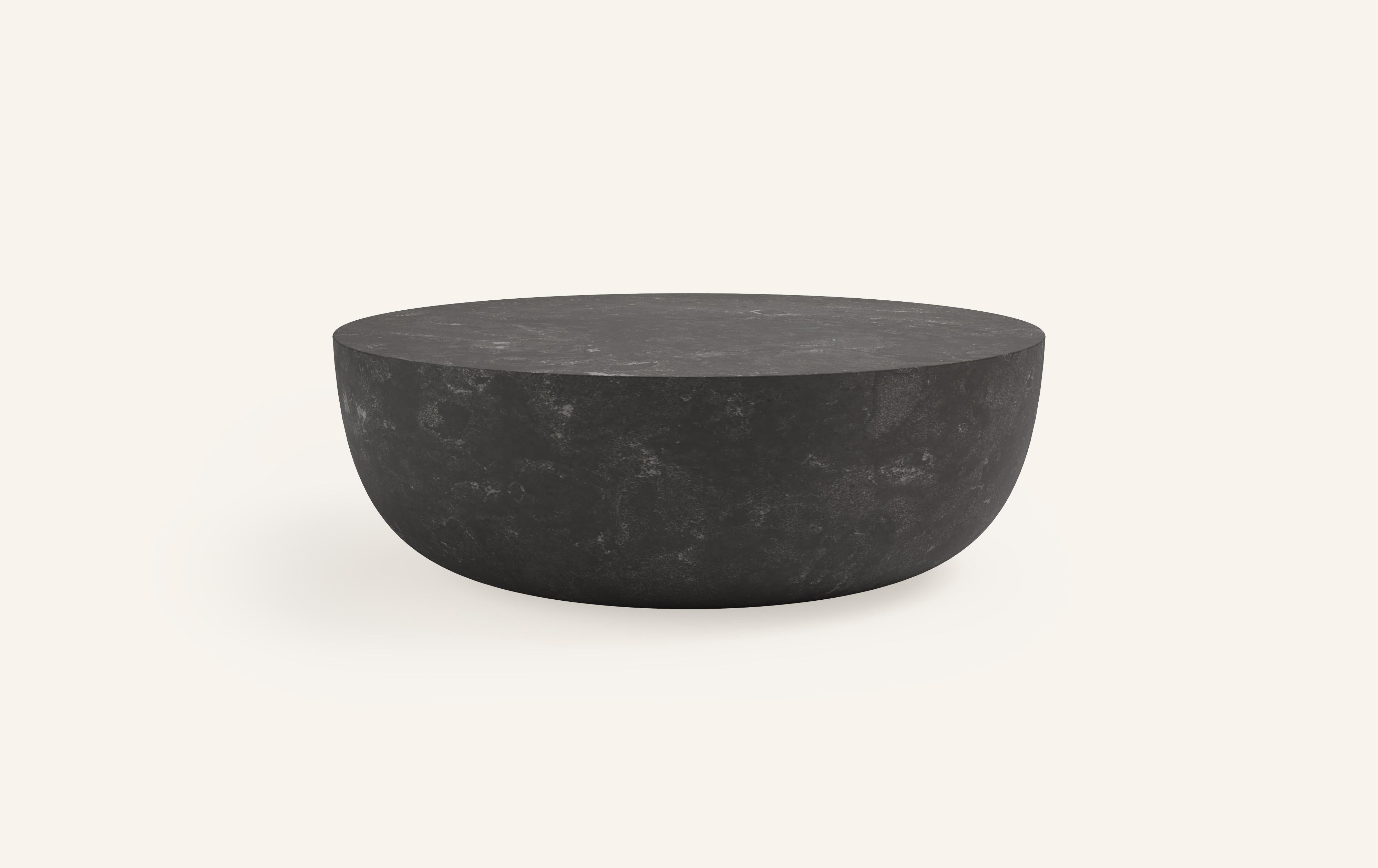 A SLICE OF A ’SPHERE’ OR 'SFERA' IN ITALIAN BALANCES A FLAT SURFACE ATOP AND ROBUST MONOLITH FORM. WITH A BASE SOFTENED BY A CURVED PROFILE, SFERA IS SOFT AND EARTHY IN ITS AVAILABLE STONE SELECTIONS.

DIMENSIONS: 
54”L x 54”W x 16”H: 
- SOLID