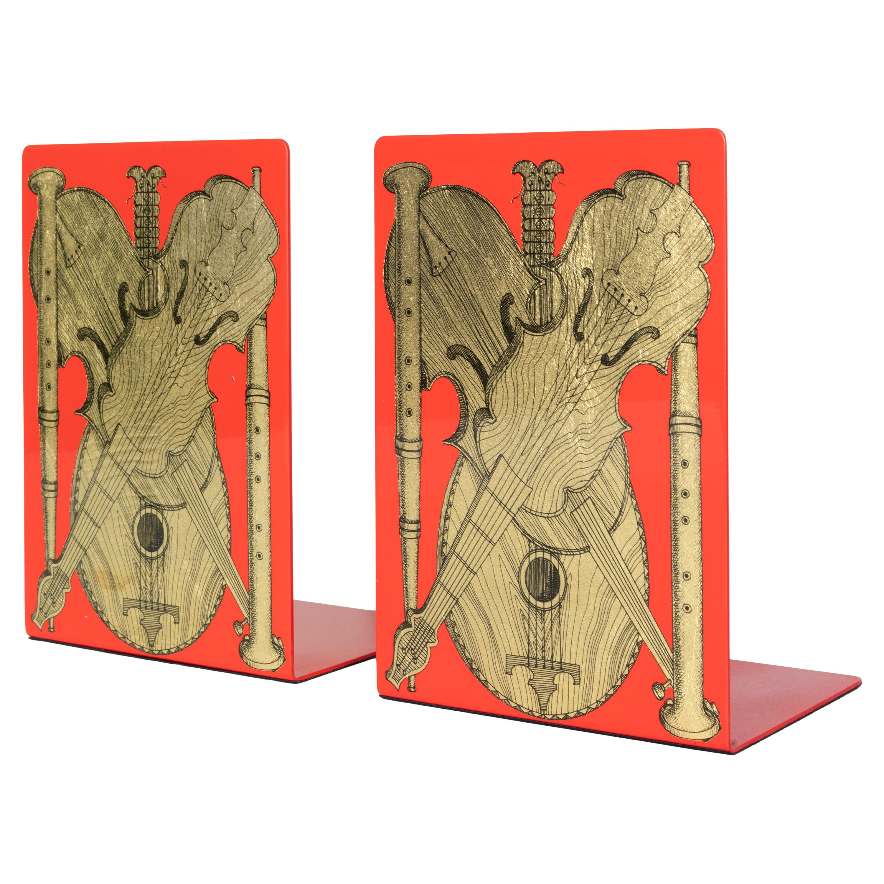 Fornasetti Bookends Strumenti Musicali Gold on Red Metal