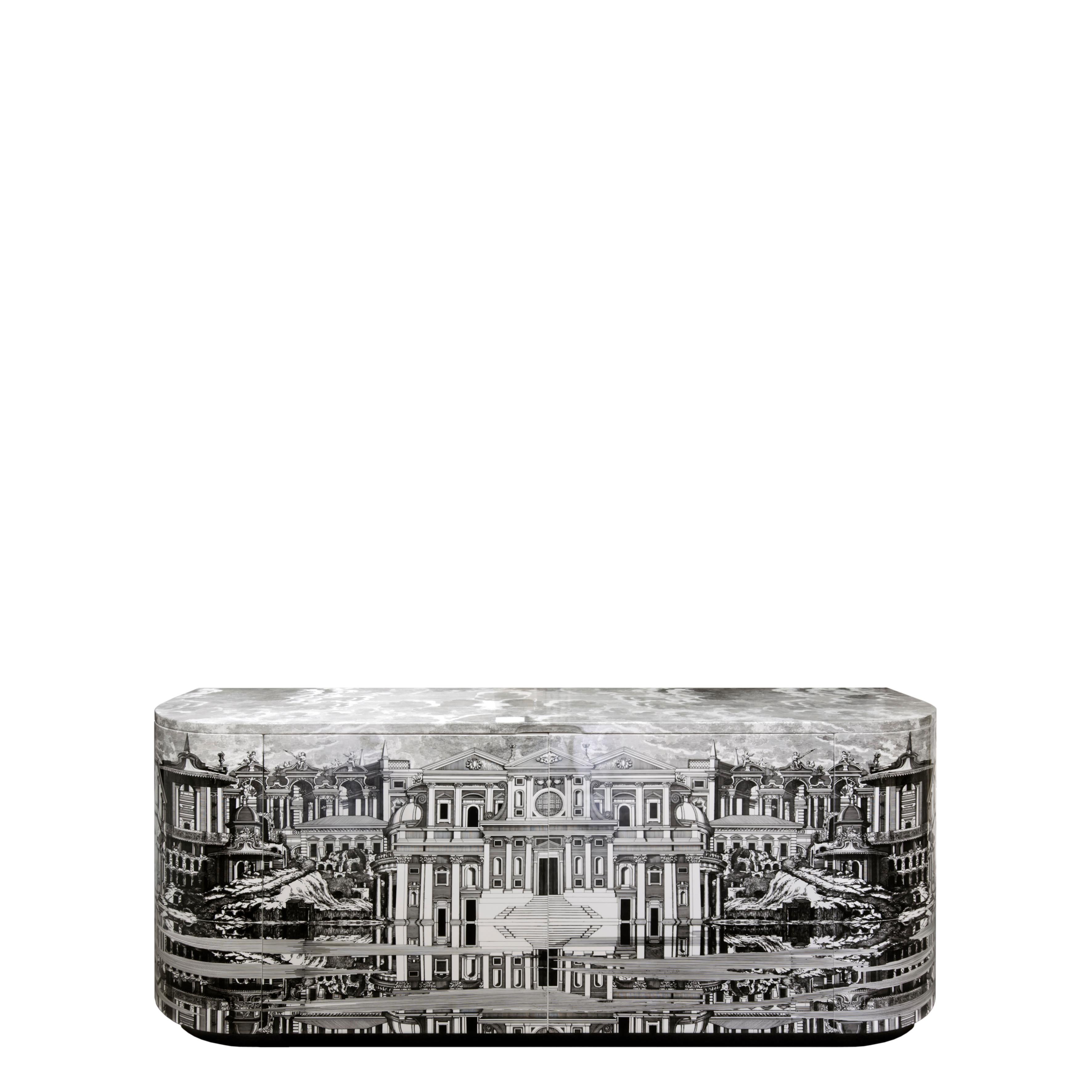 Like all Fornasetti pieces, the buffet is handcrafted using original artisan techniques.
This piece of furniture is silk-screened by hand, hand-finished and covered with a smooth lacquer.

The decoration is a surreal variation on the