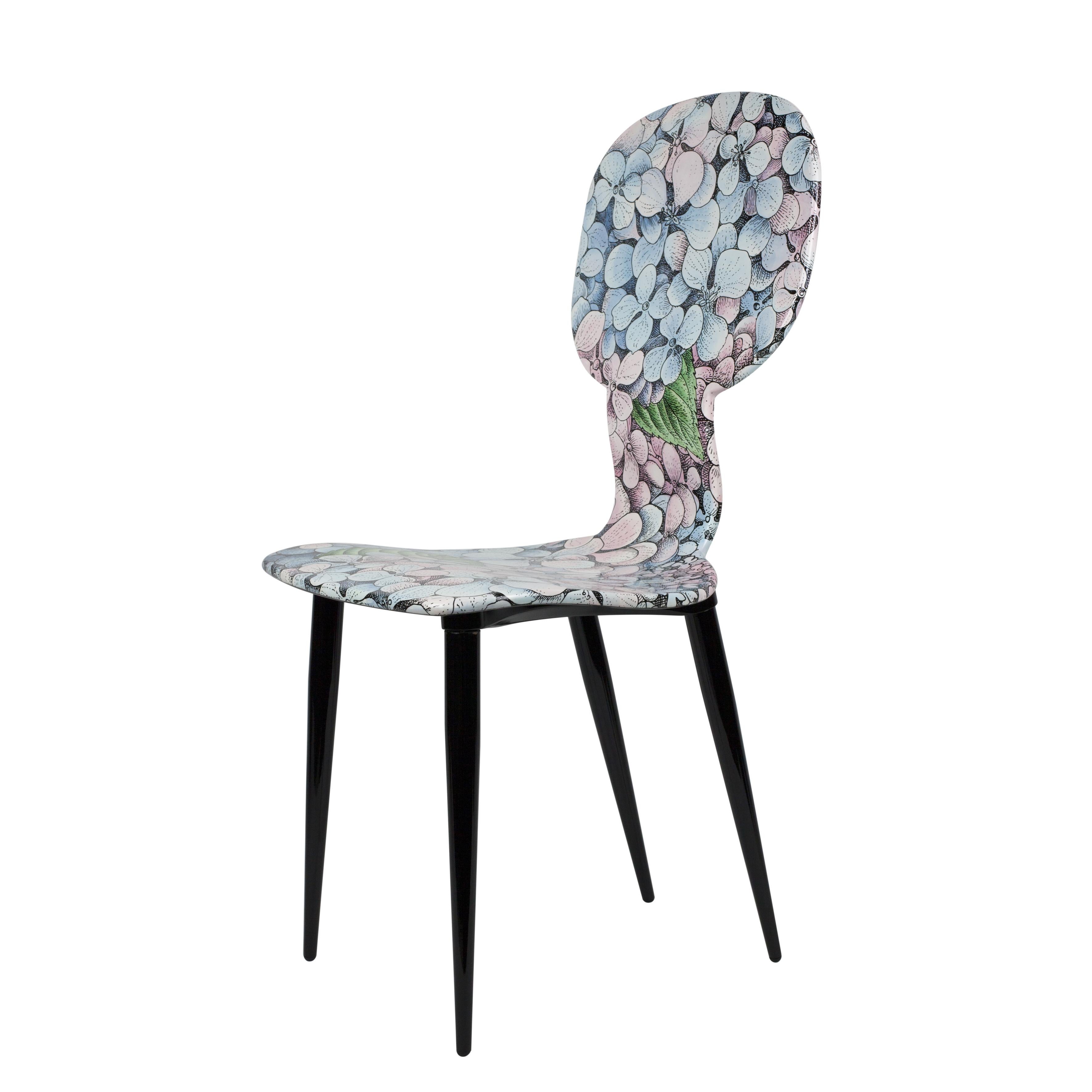 Fornasetti's take on the most classical piece of design, the chair, is a groundbreaking achievement in imagination. 

The Fornasetti chairs and stools are going to be the most surprising detail of your house. 

This chair is handcrafted using