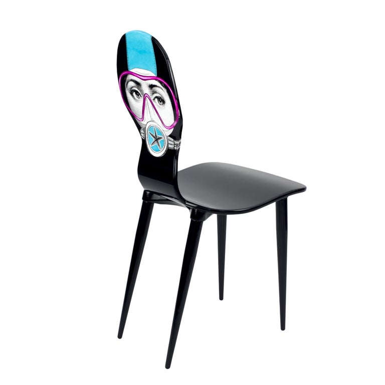 Fornasetti's take on the most classical piece of design, the chair, is a groundbreaking achievement in imagination. 

The Fornasetti chairs and stools are going to be the most surprising detail of your house. 

This chair is handcrafted using