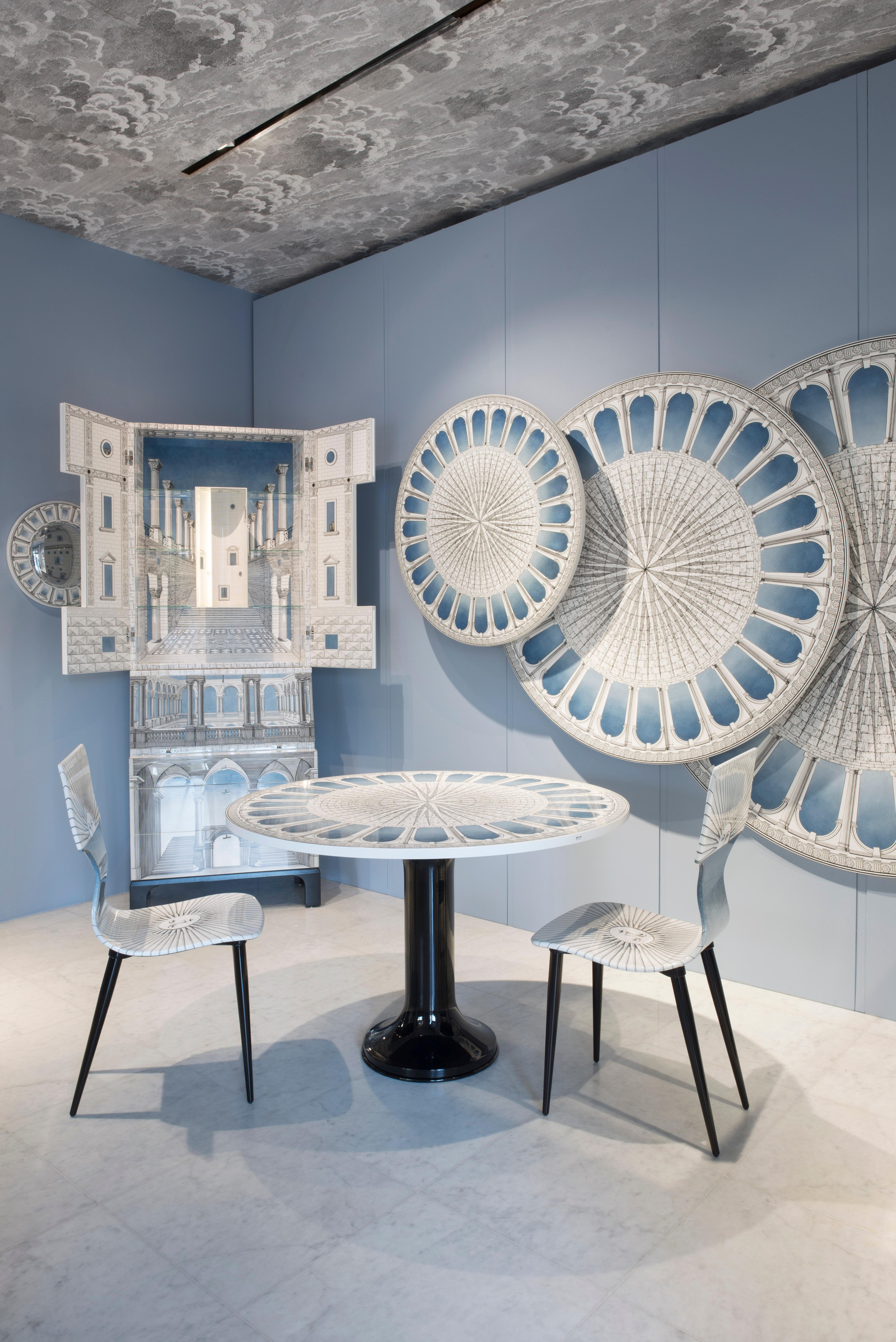Fornasetti's take on the most classical piece of design, the chair, is a groundbreaking achievement in imagination. 

The Fornasetti chairs and stools are going to be the most surprising detail of your house. 

This chair is handcrafted using