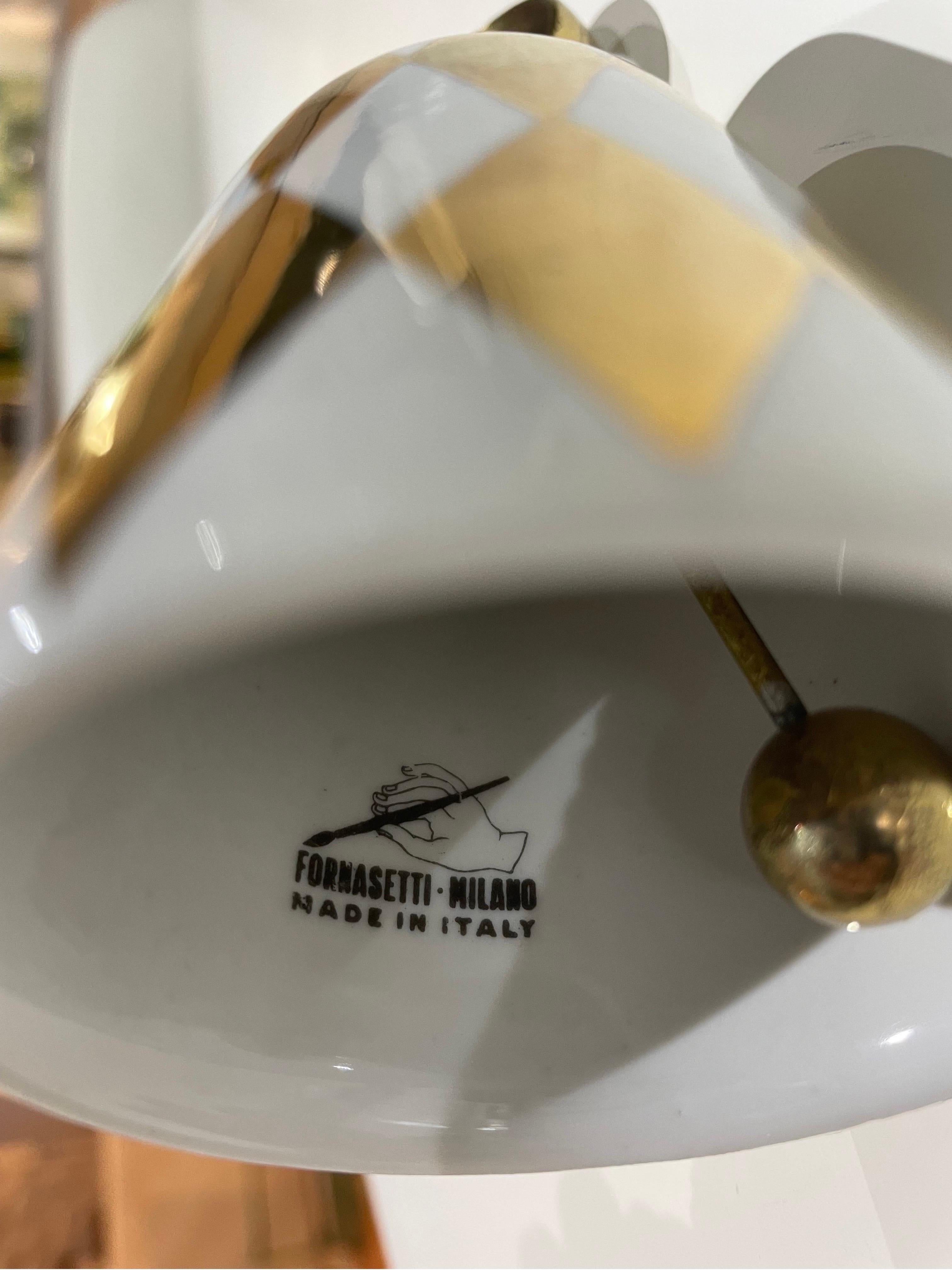 Milieu du XXe siècle Cloche en porcelaine blanche et or de Fornasetti en vente